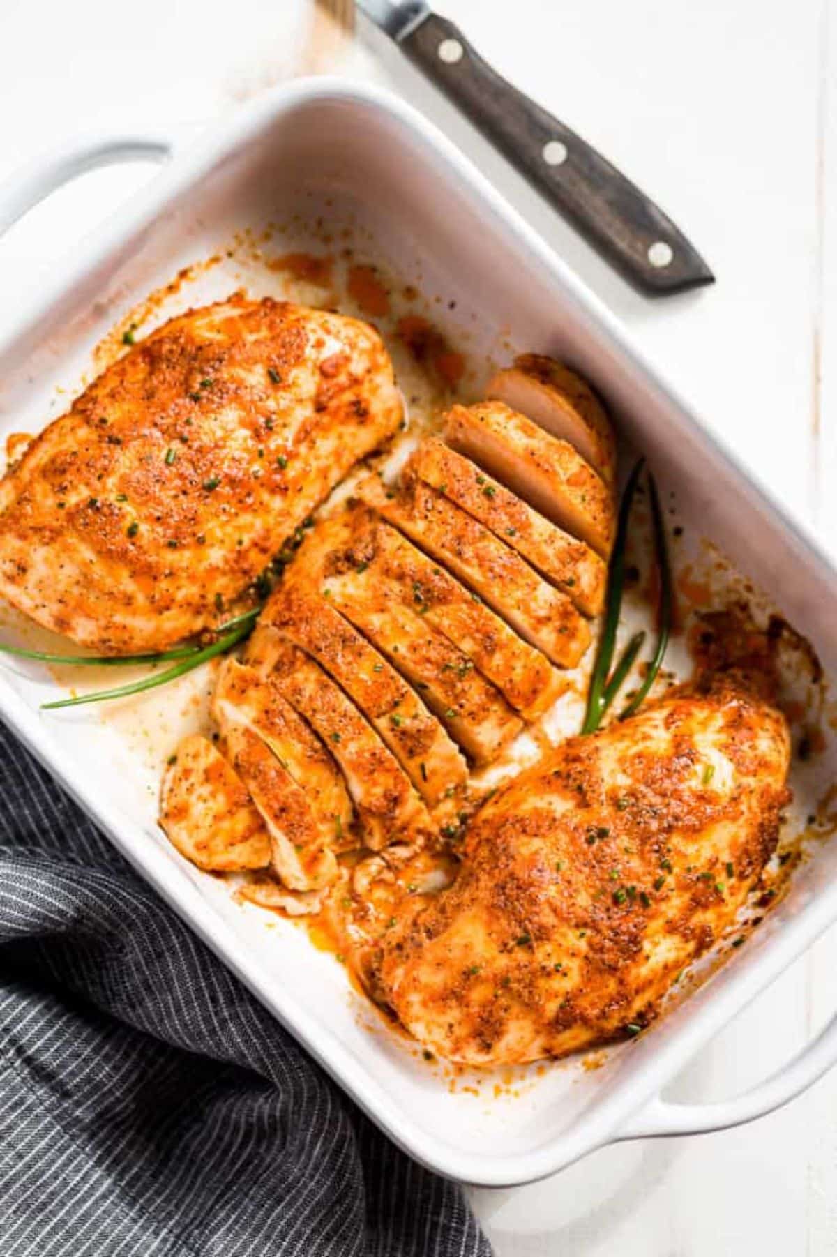 The Best Baked Chicken Breasts in a white casserole.