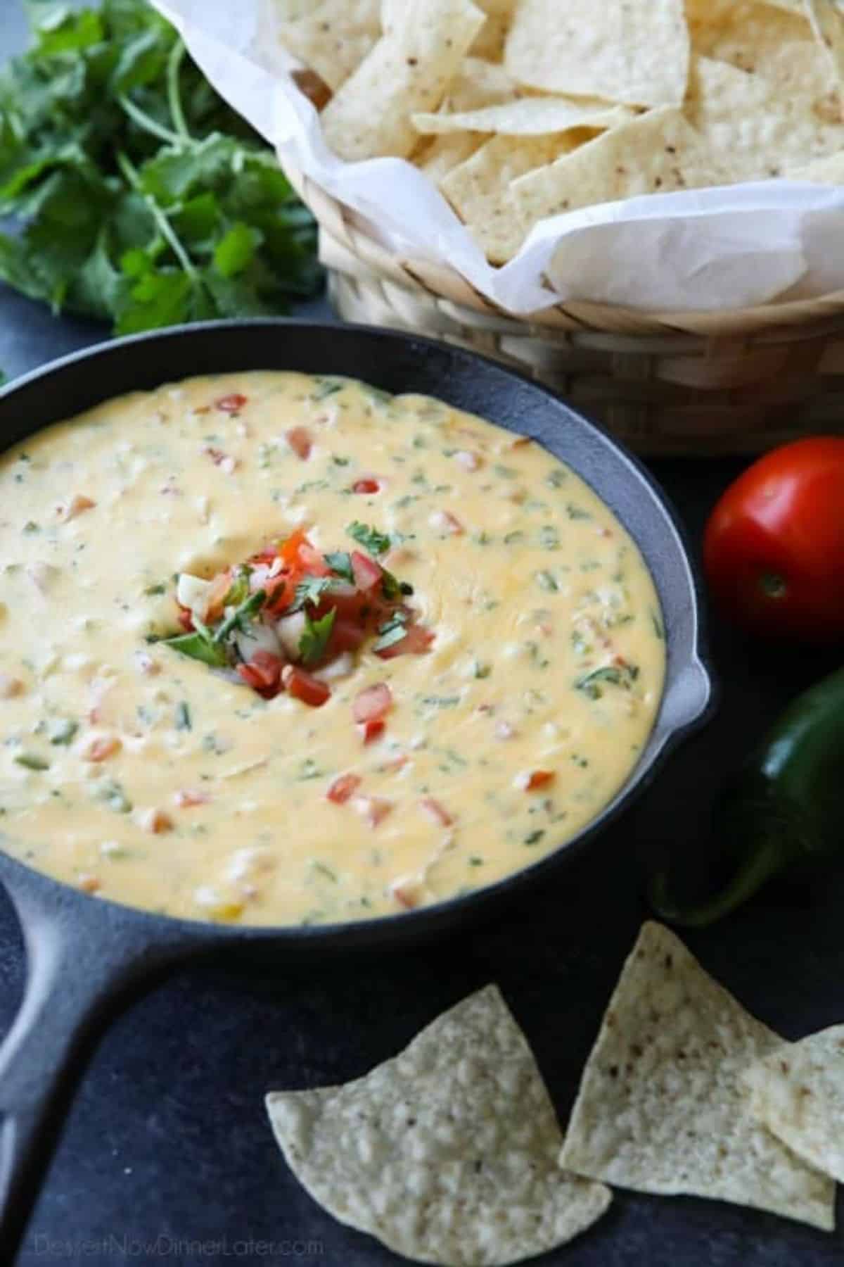 Queso Dip in a black pan.