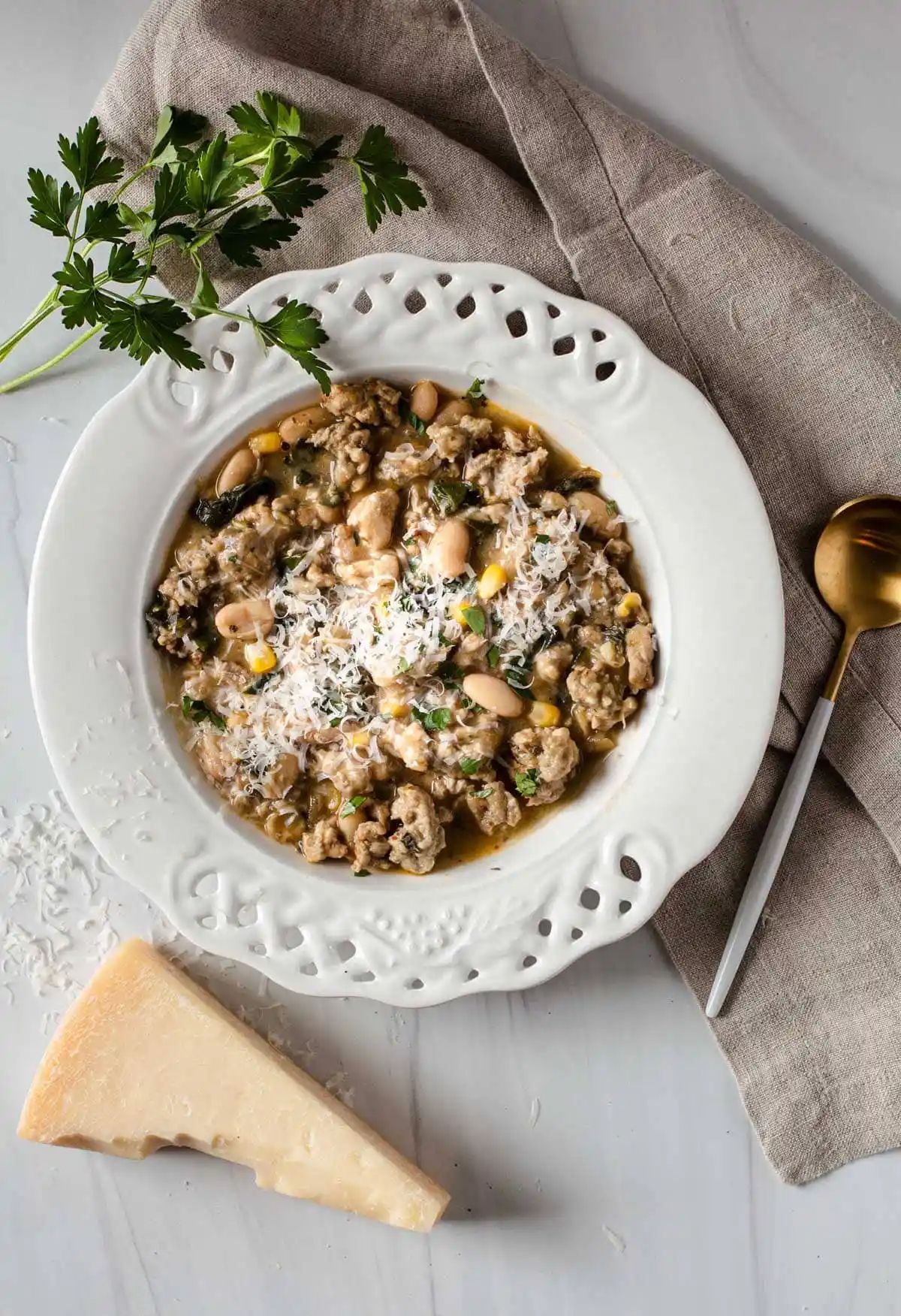 Giada's Chicken And White Bean Chili on a white plate.