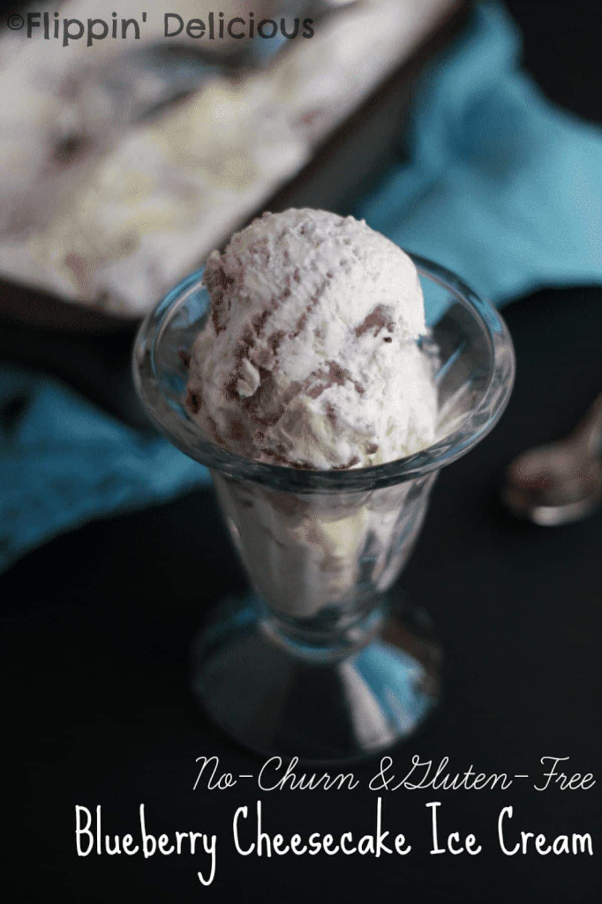 Blueberry Cheesecake Ice Cream in a glass cup.