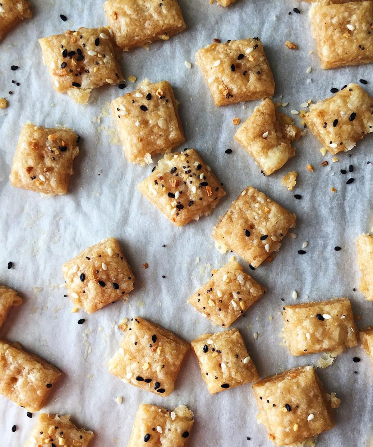 White Cheddar Crackers on a parchment paper.