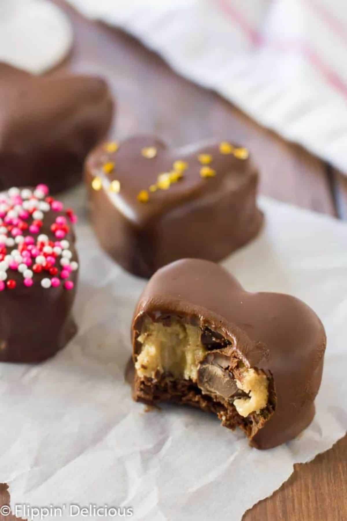 Gluten-Free Cookie Dough Brownie Truffles on a piece of parchment paper.