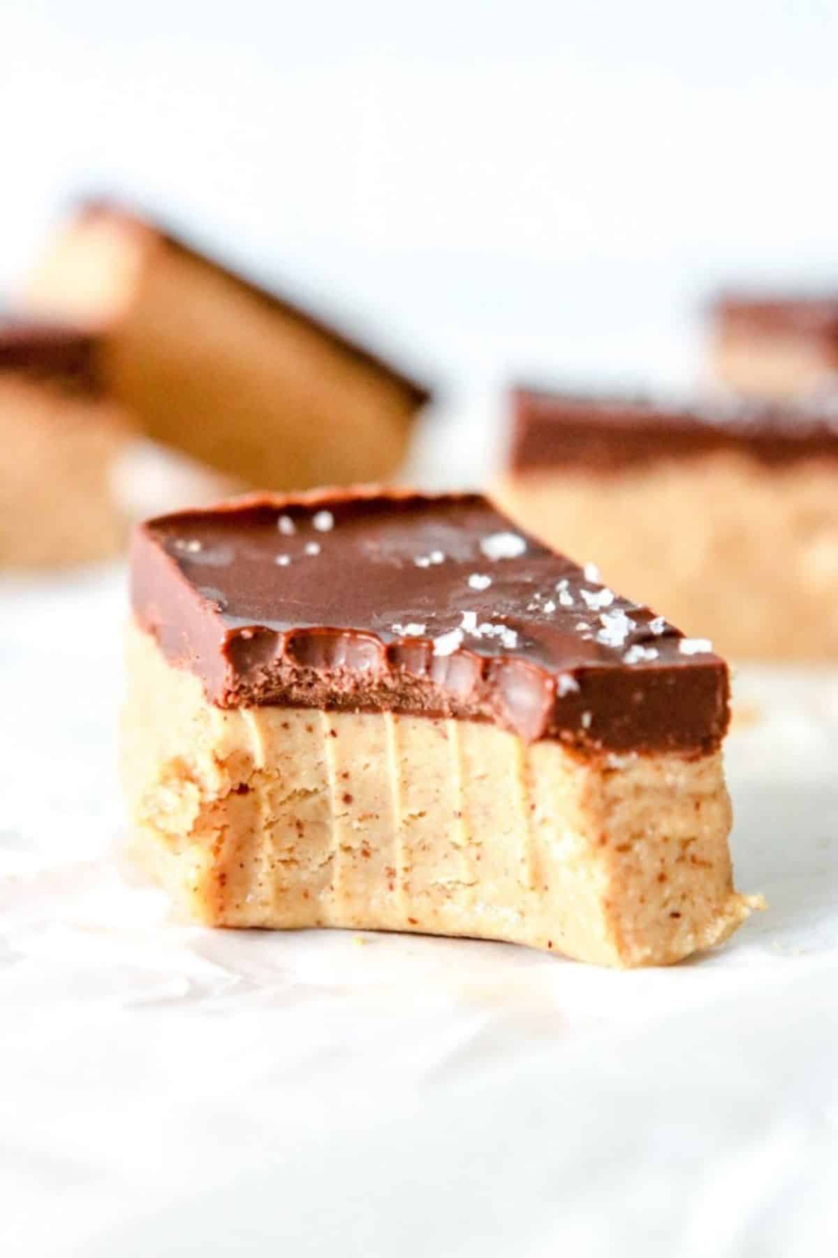 A bitten No Bake Almond Butter Bar.