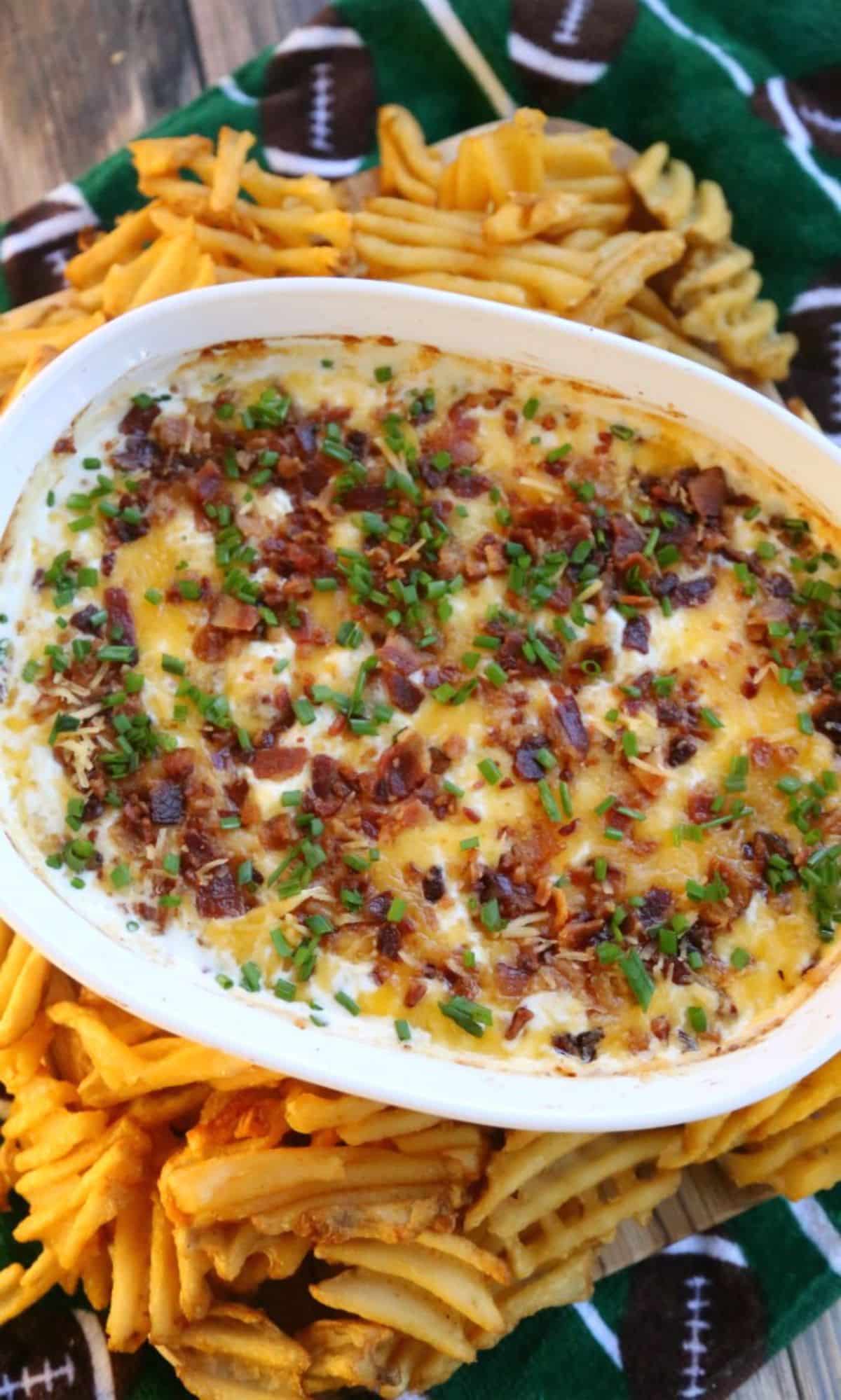 Hot Loaded Baked Potato Dip in a white casserole.