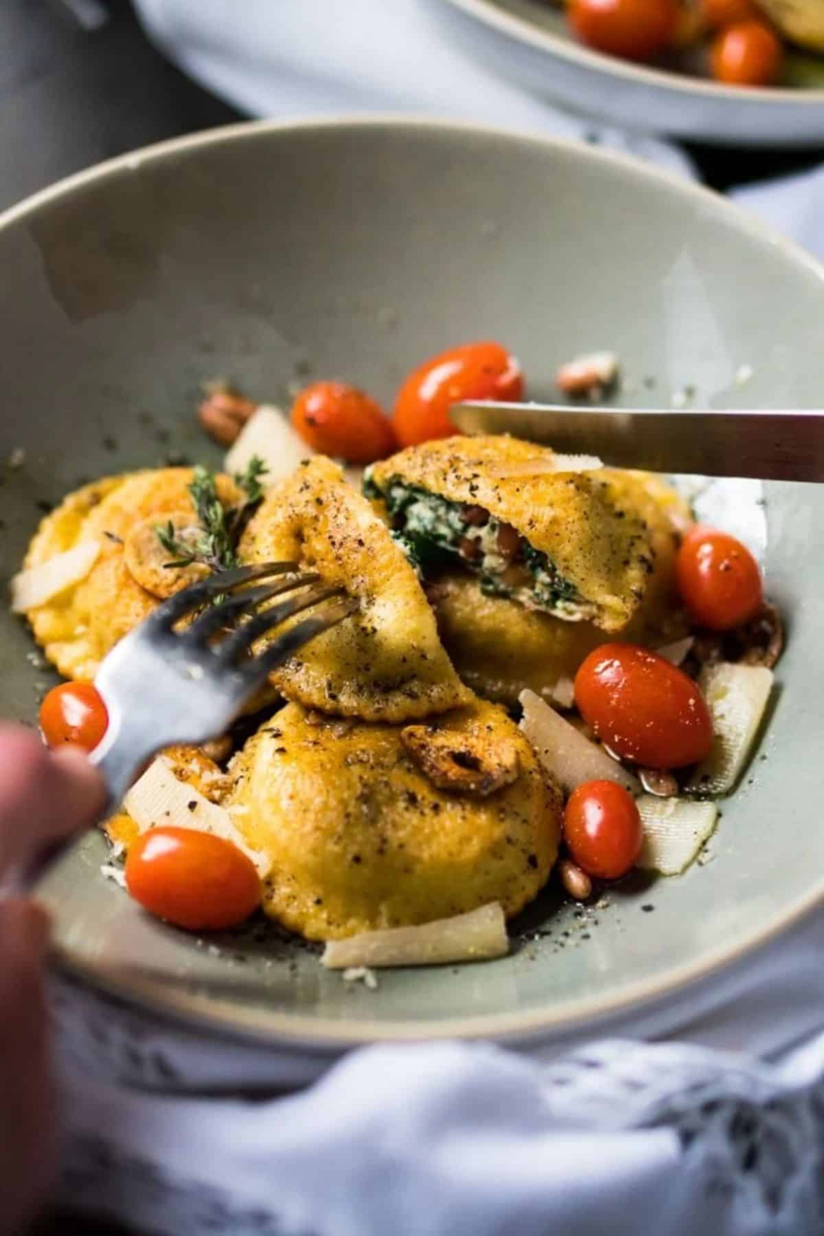 Spinach and Ricotta Keto Ravioli in a gray bowl.