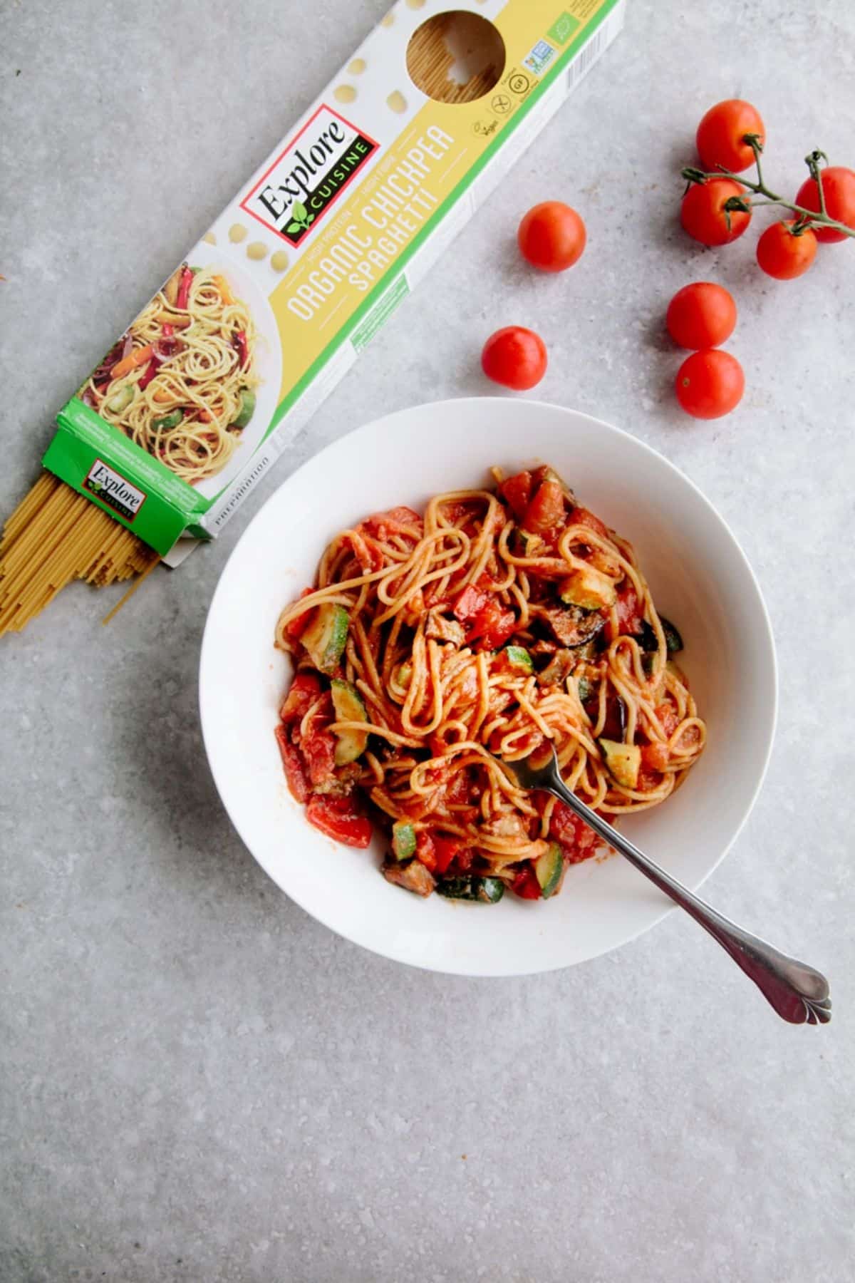 One-pot Ratatouille Spaghetti in a white bowl with a fork.