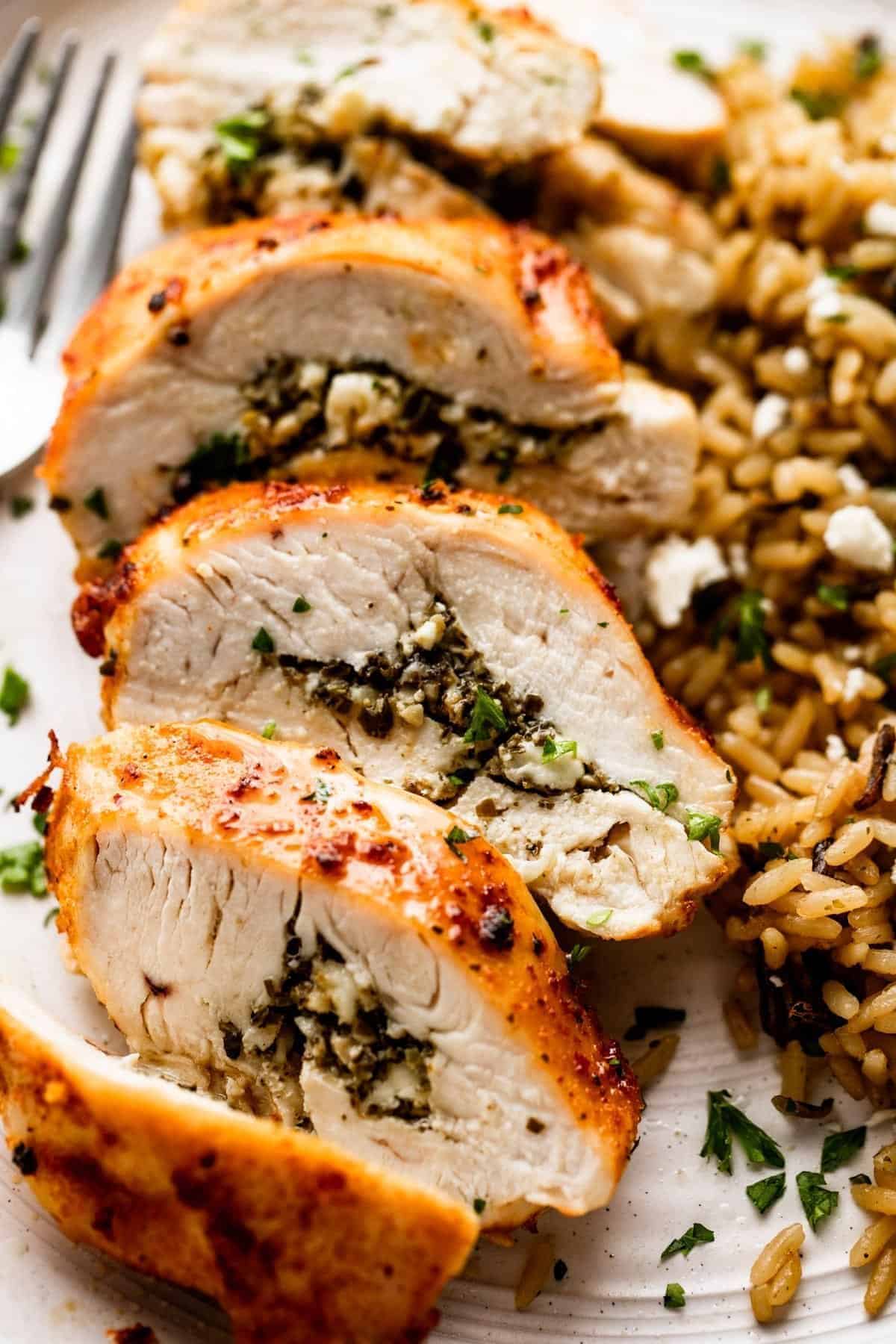 Air Fryer Stuffed Chicken Breast on a white plate.