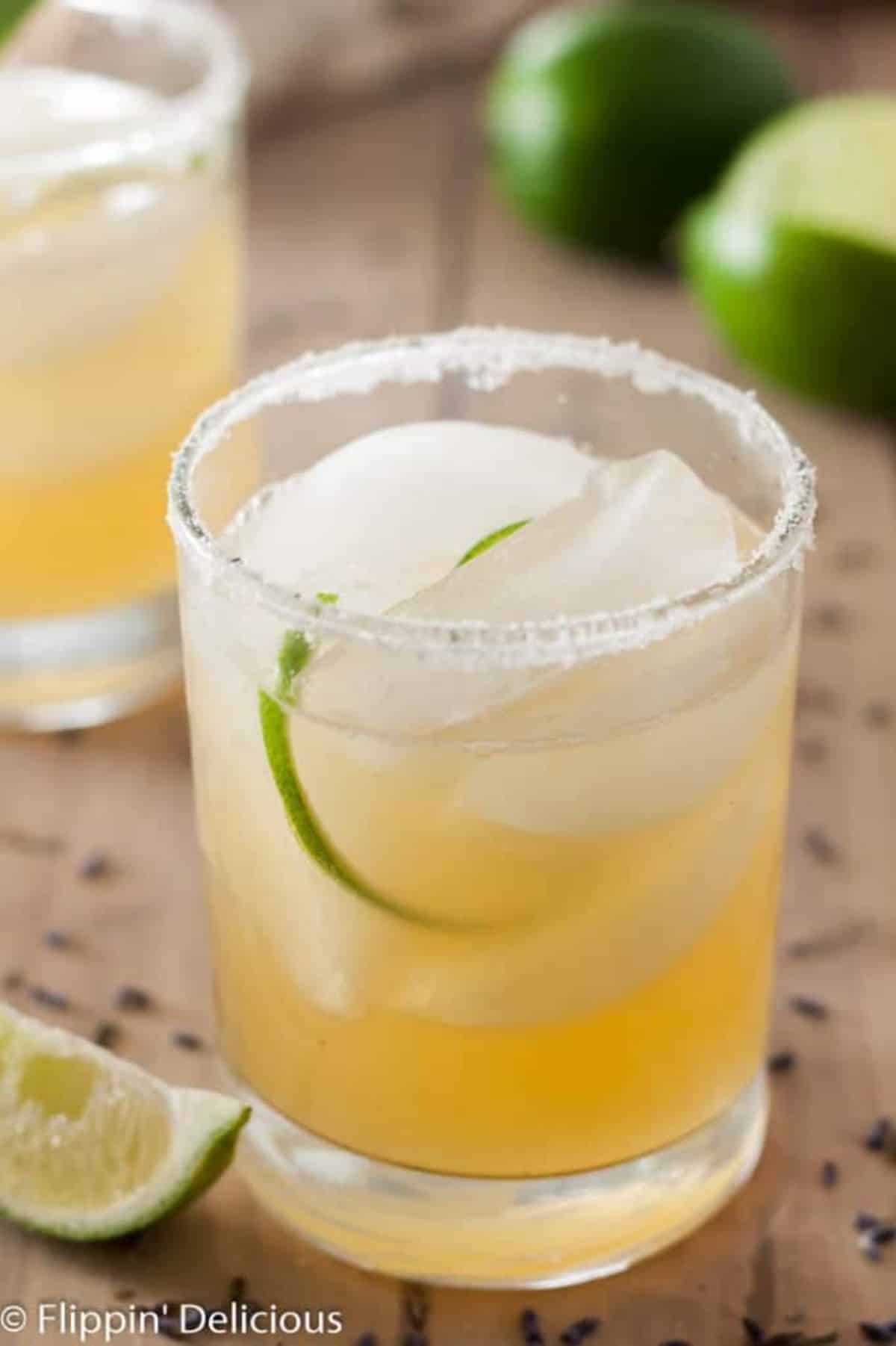 Lavender Honey Margarita in a glass cup.