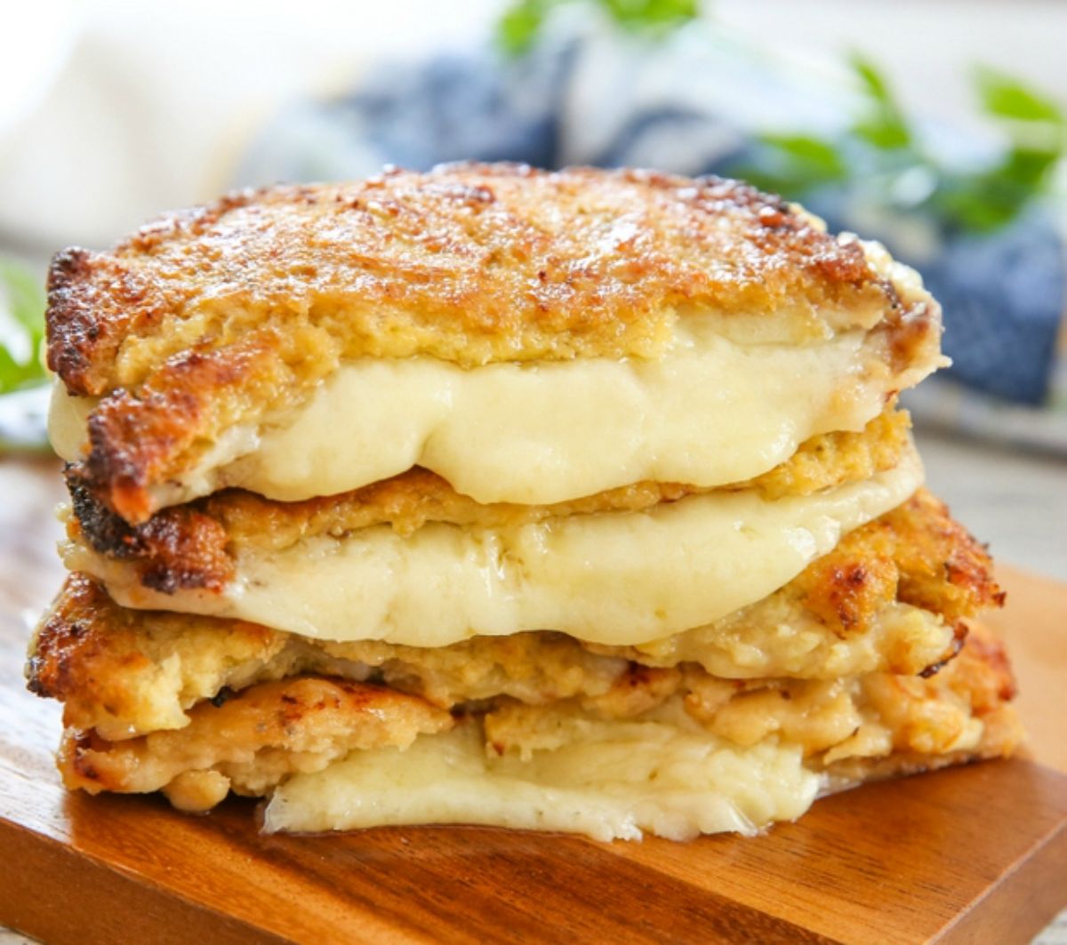 Cauliflower Grilled Cheese Sandwich on a wooden cutting board.