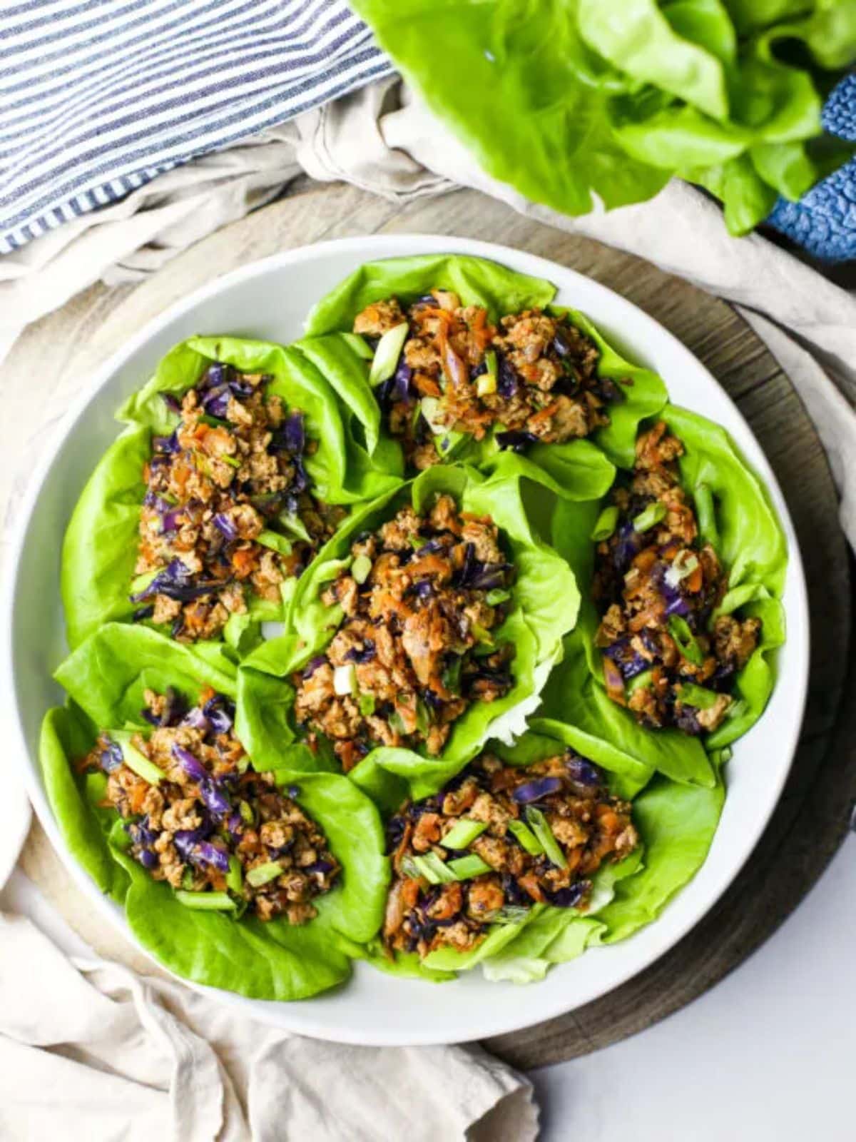 Ground Chicken Lettuce Wraps on a white plate.