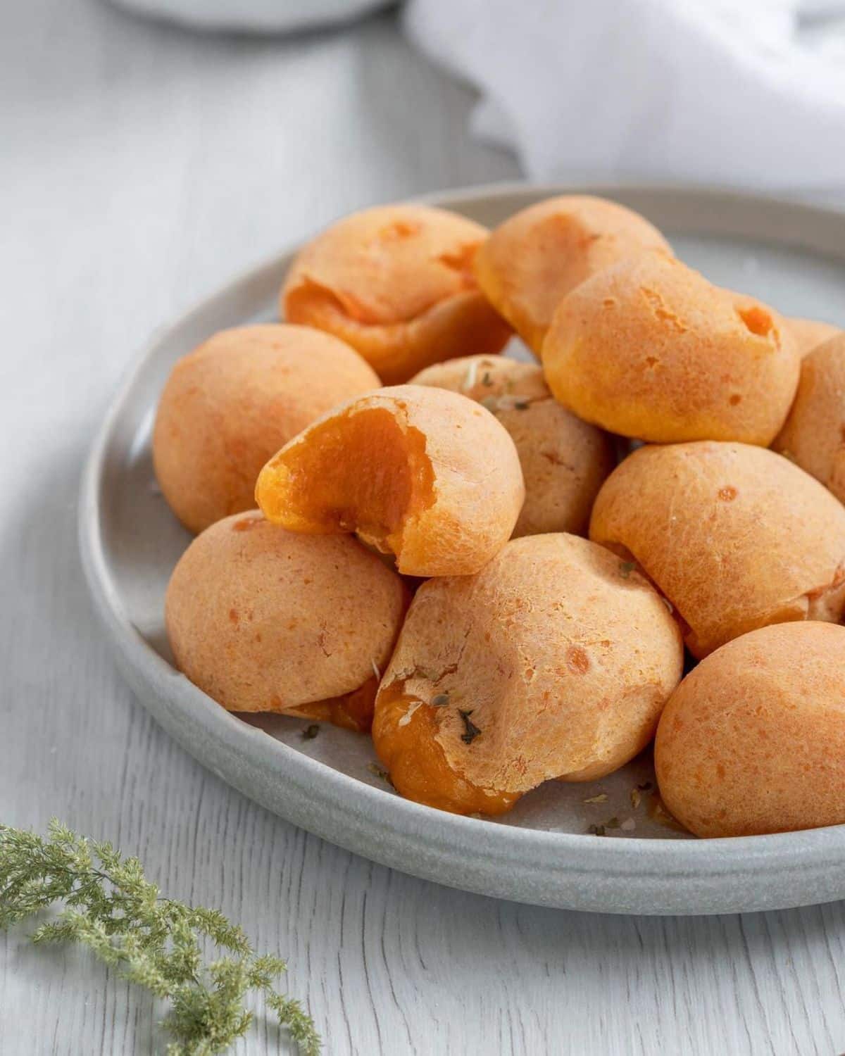 Gluten-Free Brazilian Cheese Bread on a gray tray.