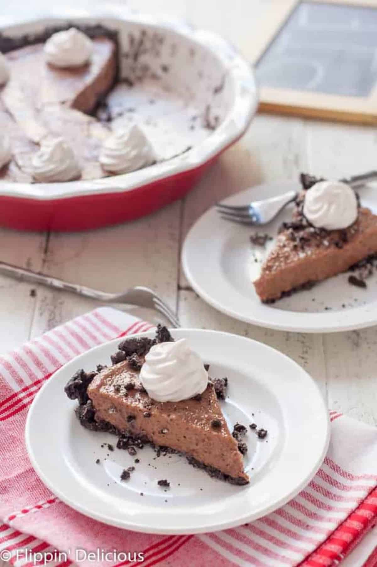 Pieces of Gluten-Free Vegan Chocolate Pie on white plates.