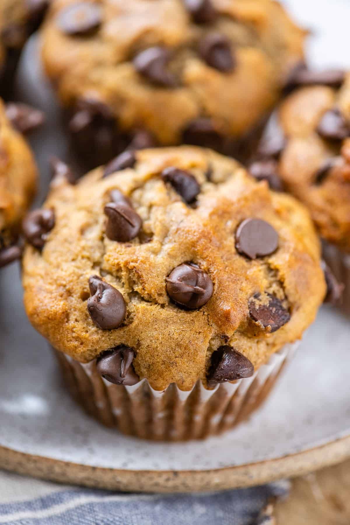 Delicious Gluten-Free Banana Muffins on a gray tray.