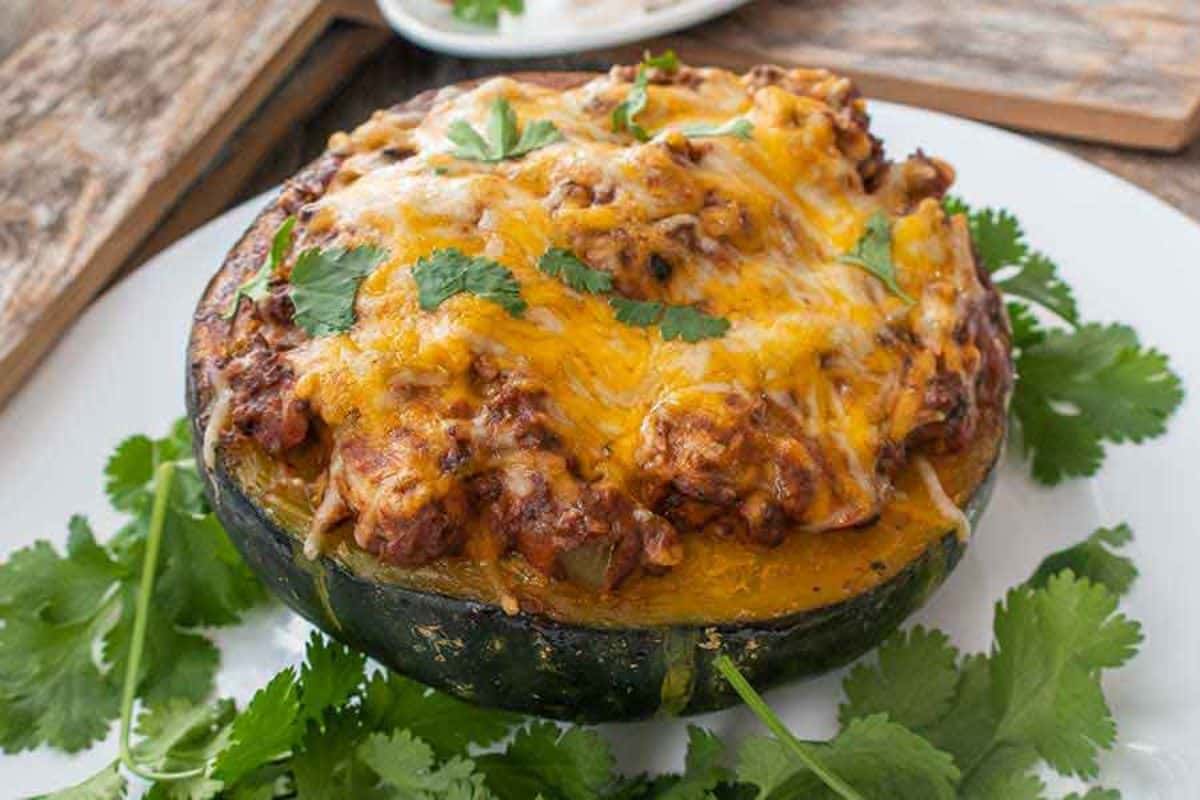 Taco Stuffed Roasted Kabocha on a white plate.