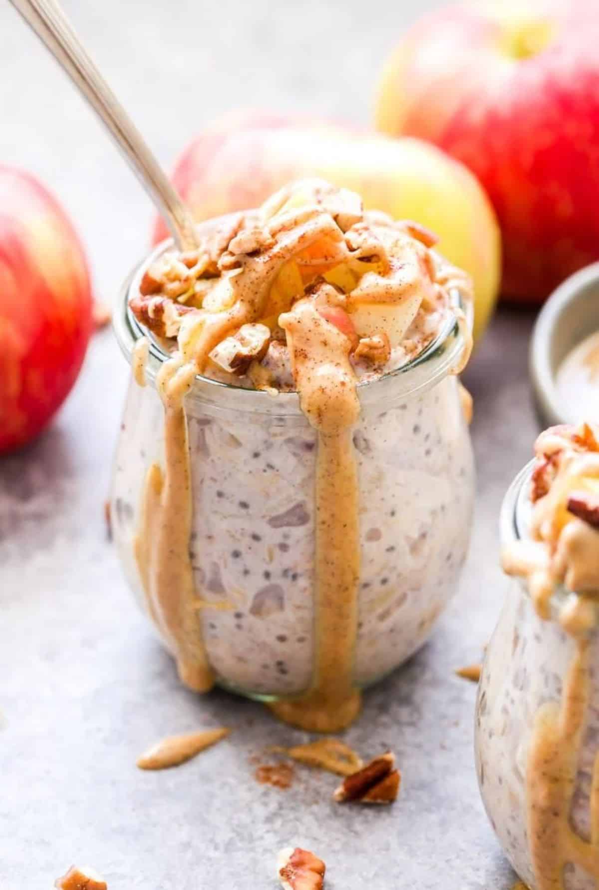 Delicious Apple Cinnamon Overnight Oats in a glass jar.