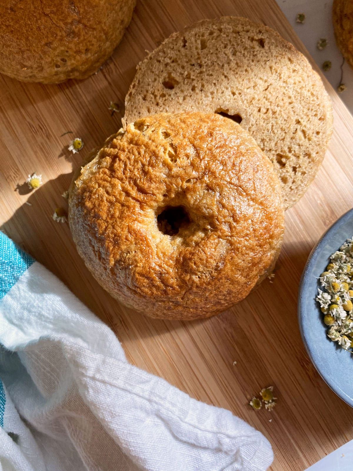 Delicious Paleo Bagels on a wooden tray.