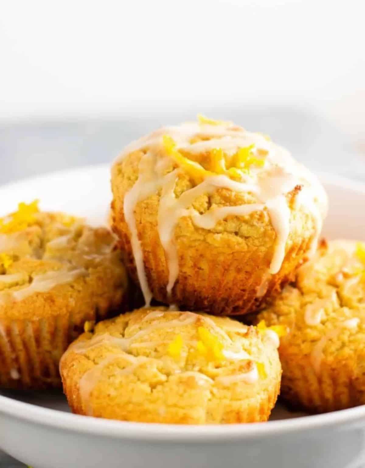 Delicious Gluten-Free Orange Muffins in a white bowl.