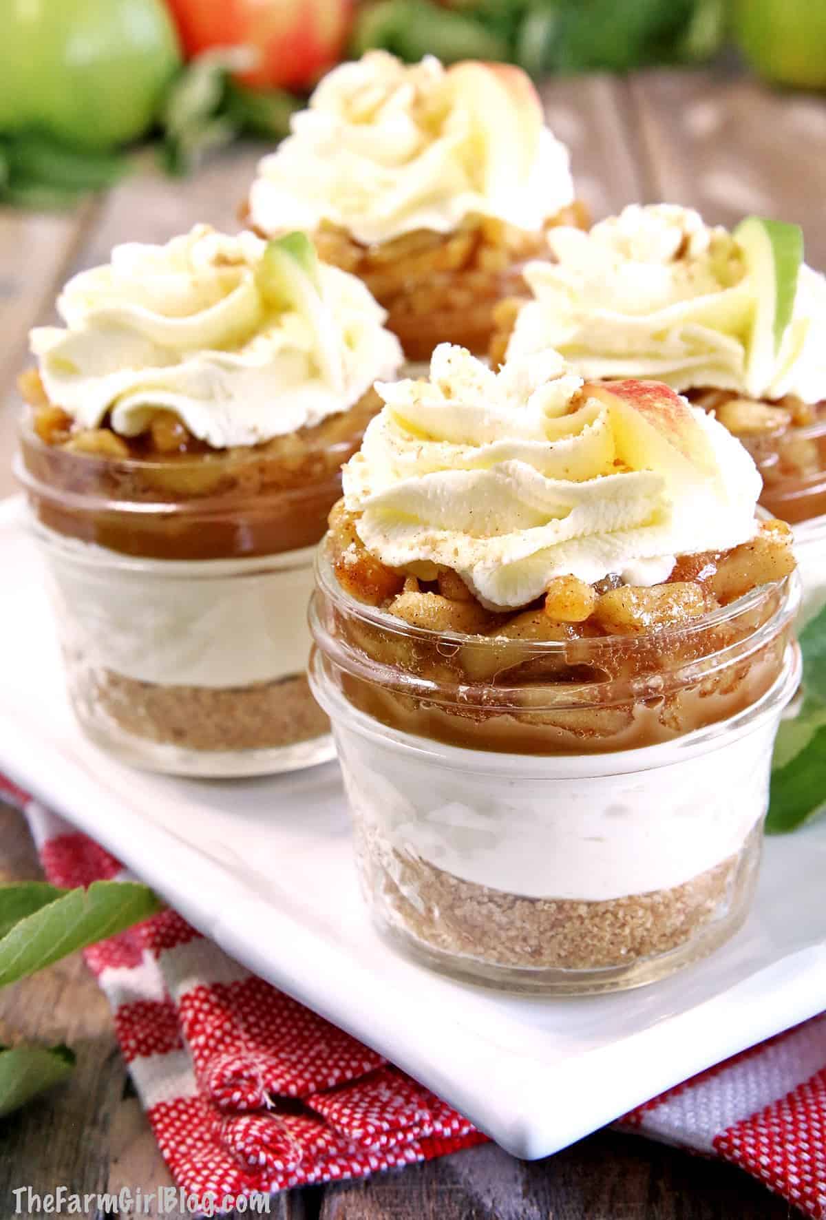 Delicious gluten-free Caramel Apple Pie Parfaits in glass jars.