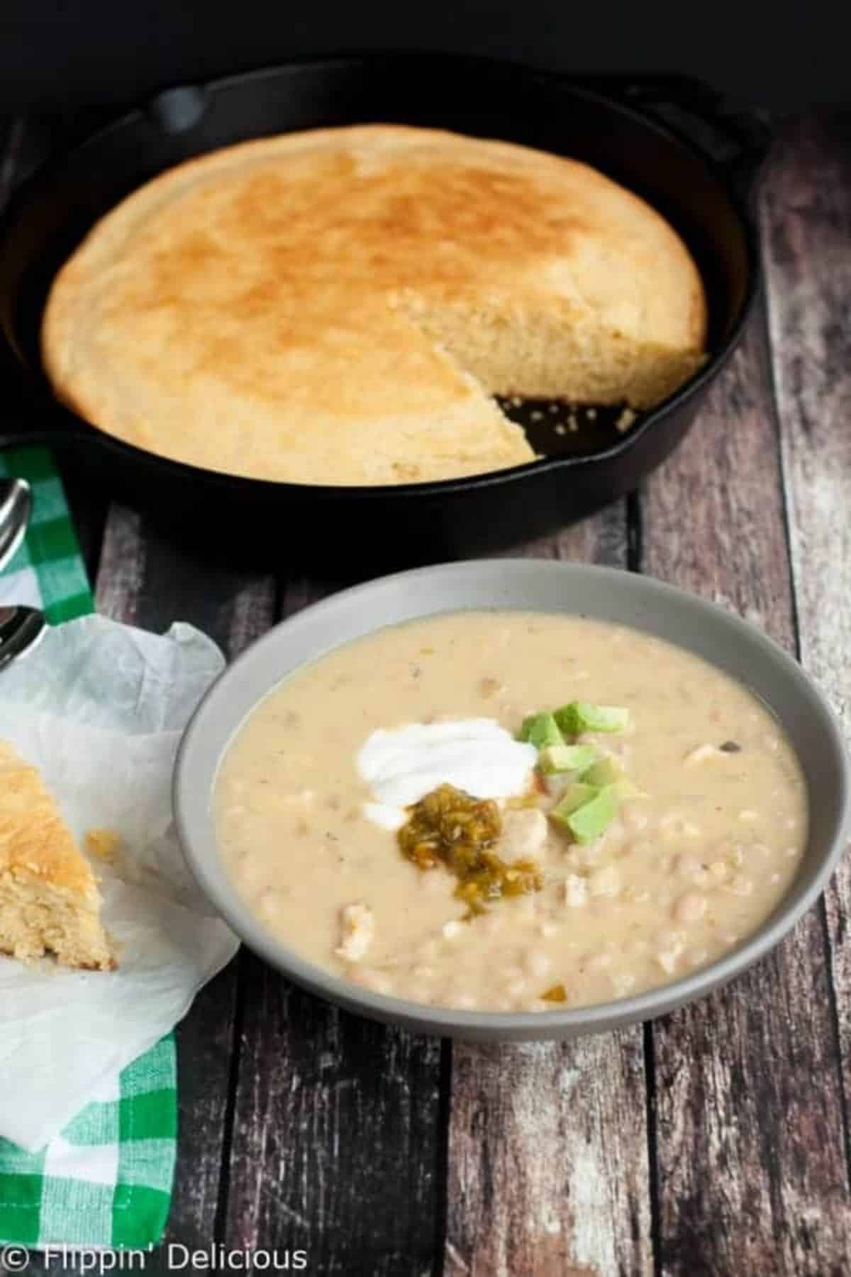 Delicious Green Chile White Bean Chicken Chili in a gray bowl.