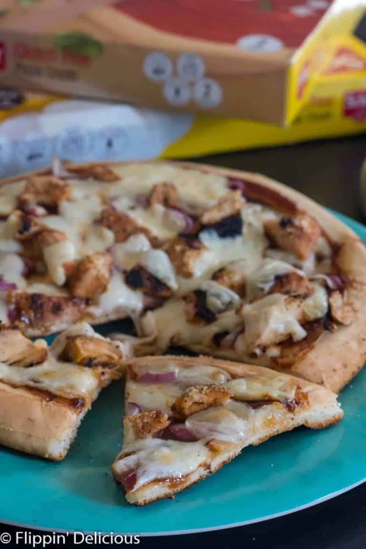 Gluten-Free Grilled Chicken Pizza on a blue tray.
