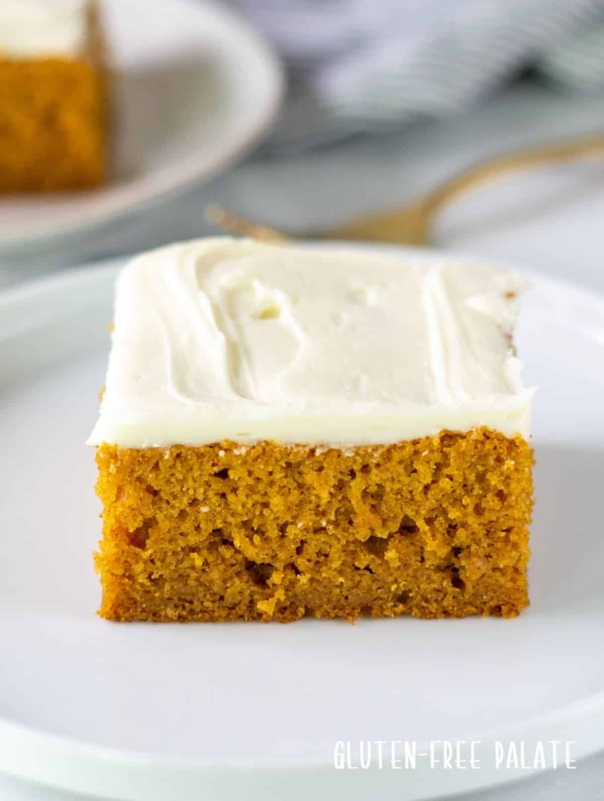 A piece of Gluten-Free Pumpkin Cake on a white plate.