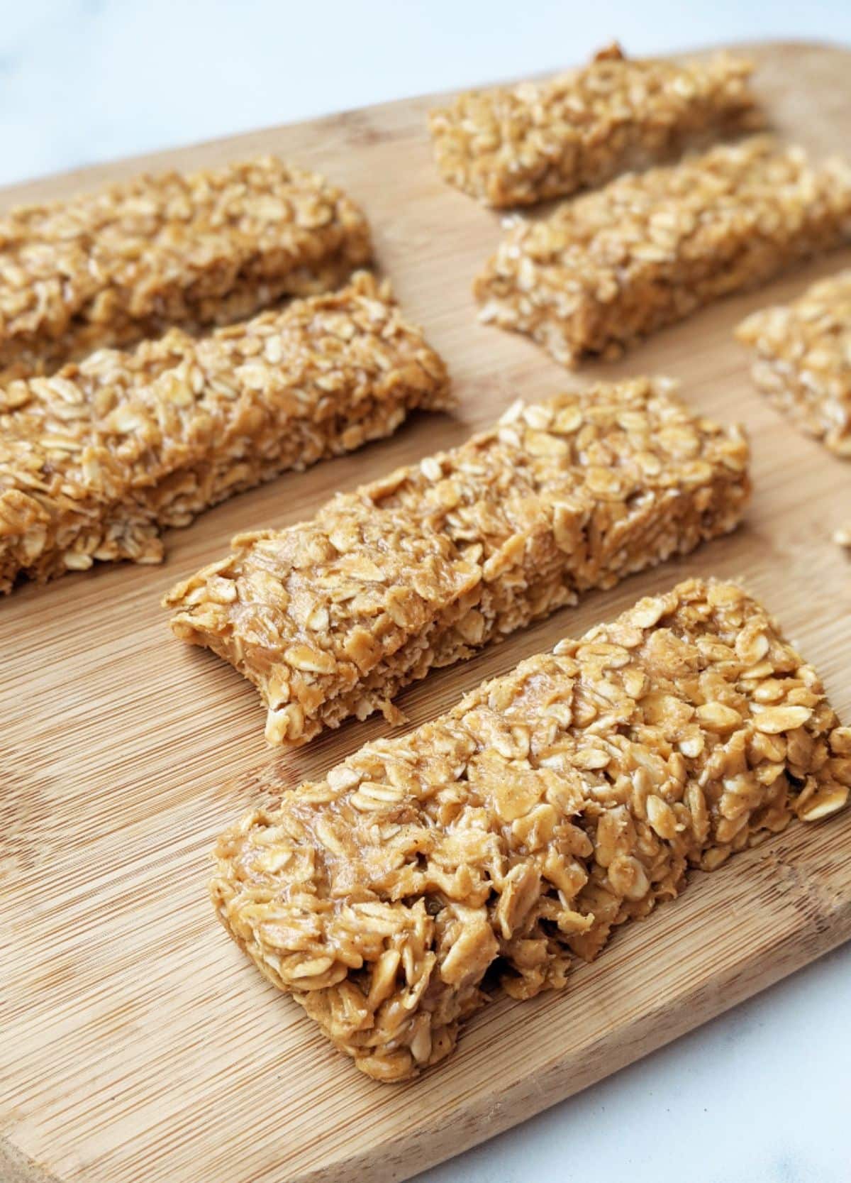 Healthy Ingredient No-Bake Granola Bars on a wooden tray.