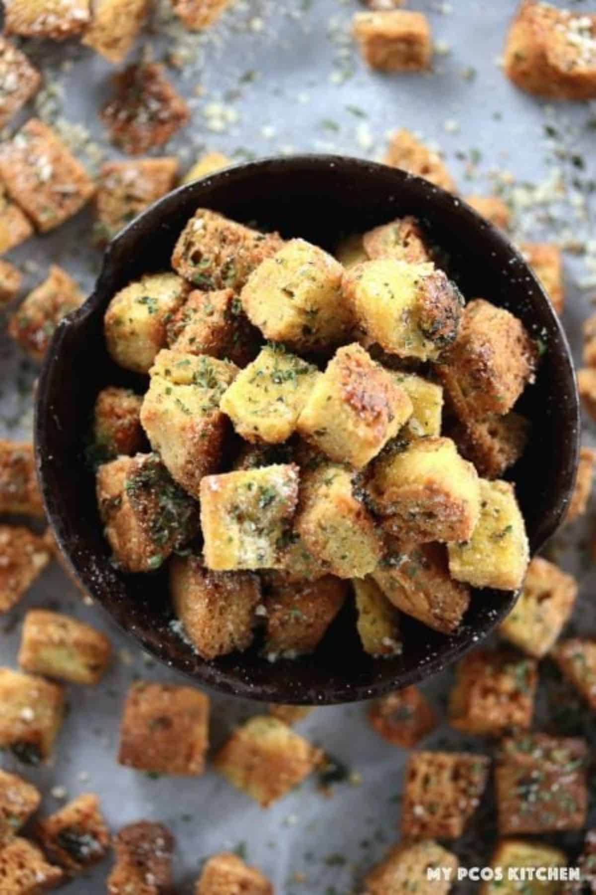 Crispy Low-Carb Gluten-Free Croutons in a black bowl.