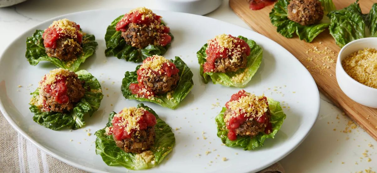Delicious Fancy Vegan Meatballs on a white tray.