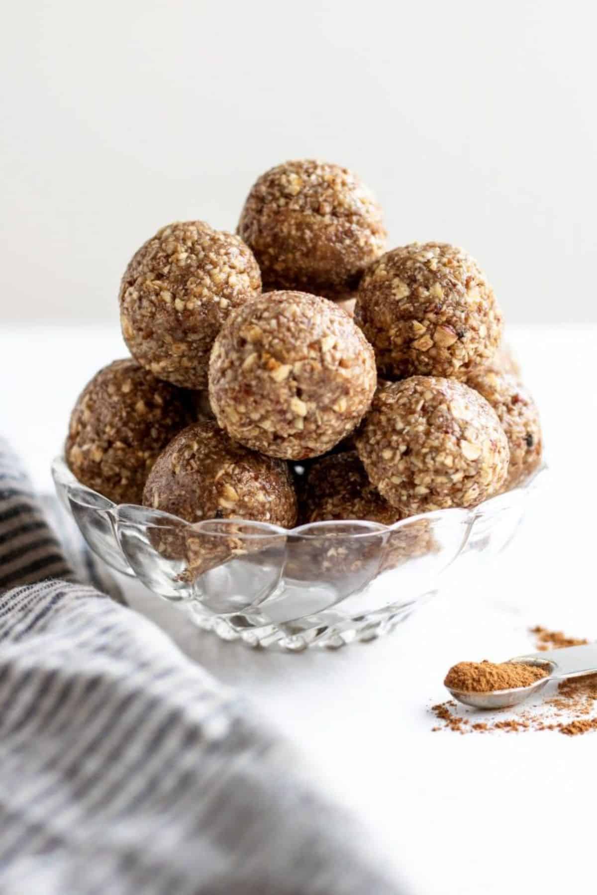 Pumpkin Pie Spice Energy Balls in a glass bowl.