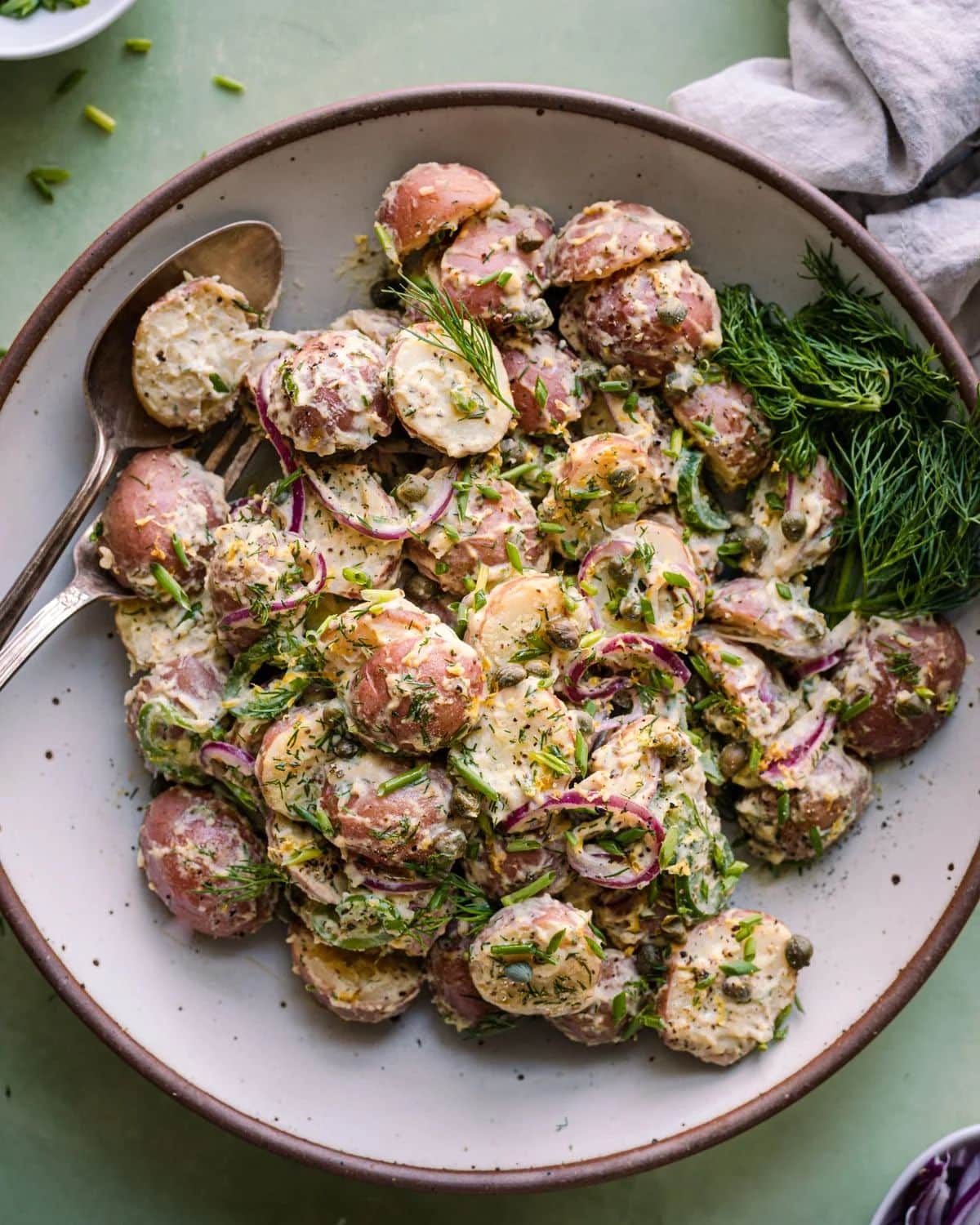 Delicious Vegan Potato Salad in a gray bowl.