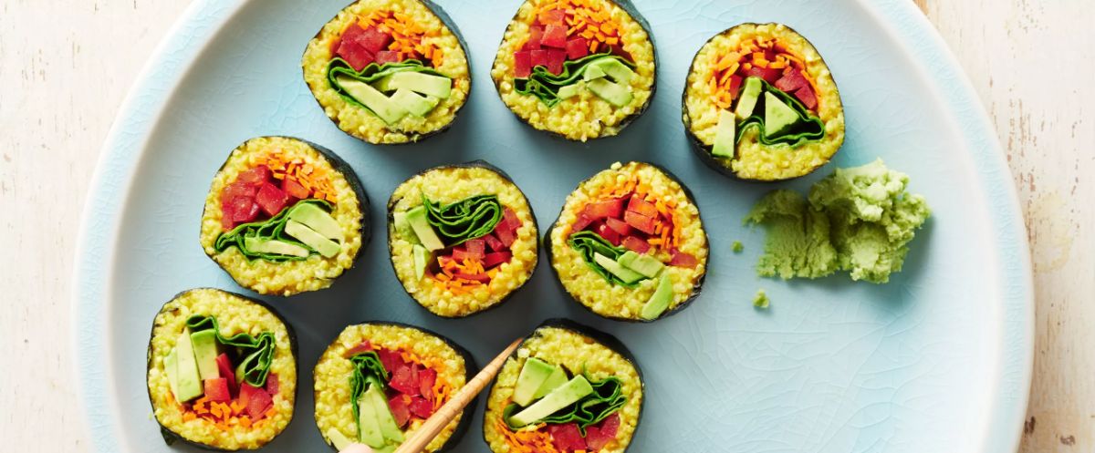 Crunchy Curried Millet Sushi on a blue  tray.