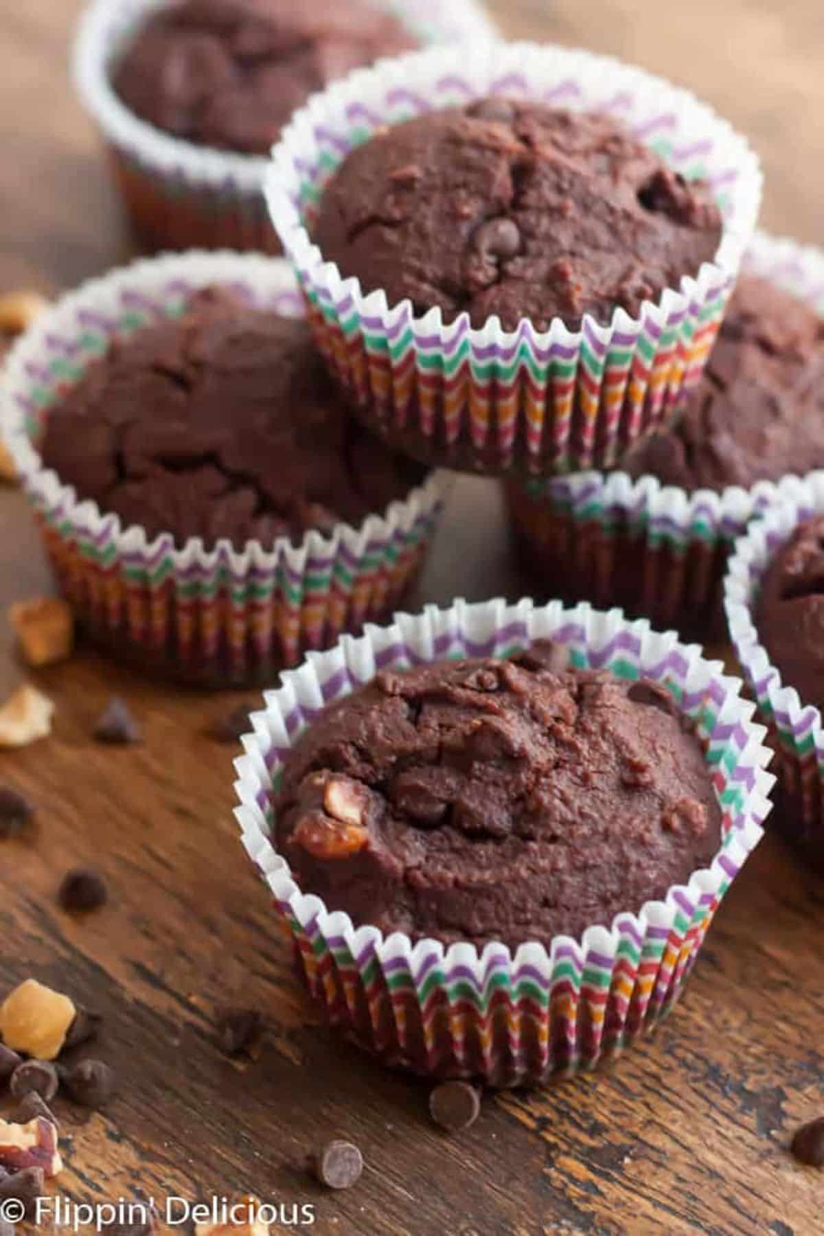 Delicious Gluten-Free Chocolate Hazelnut Muffins on a wooden table.