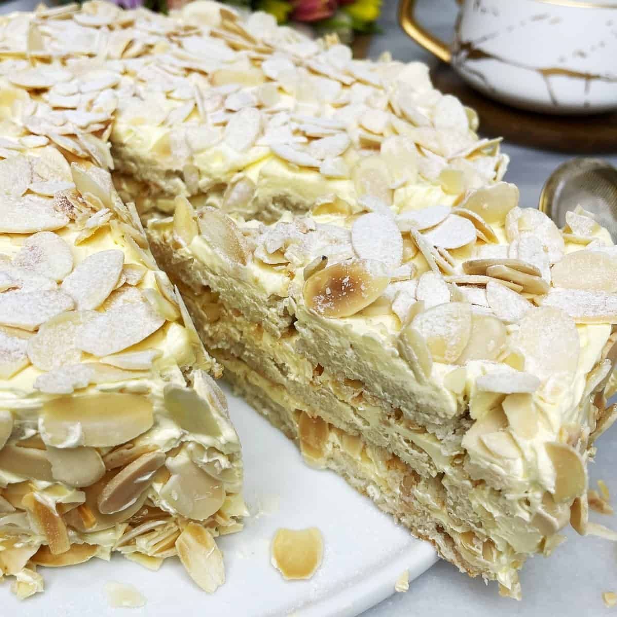 Delicious Gluten-Free Almond Cake on a white tray.