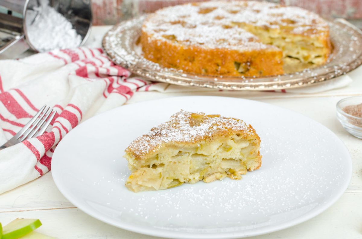 A piece of gluten-free Apple Sharlotka Cake on a white plate.