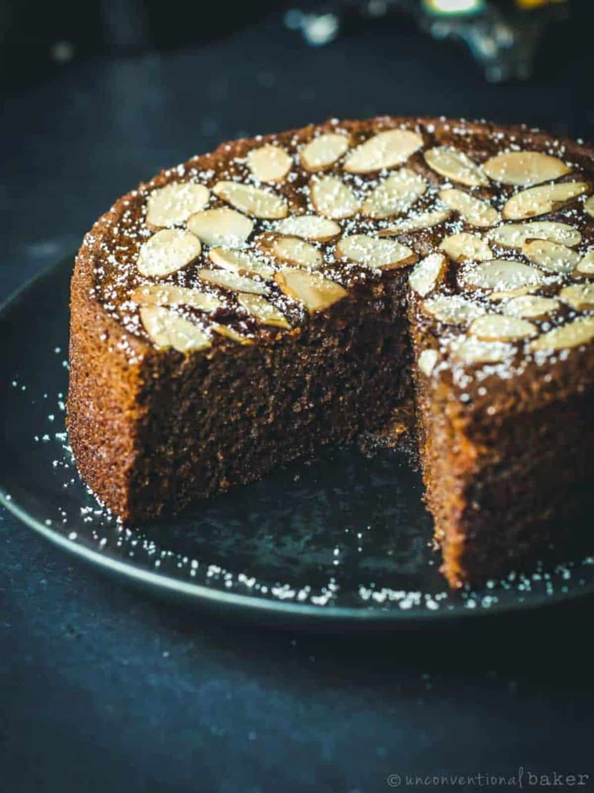 Delicious Cassava Almond Orange Cake on a black tray.