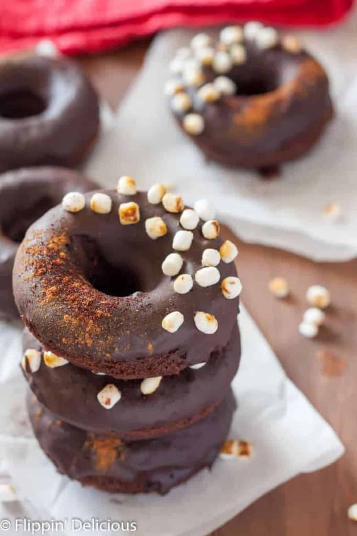 A pile of delicious Gluten-Free Mexican Hot Chocolate Donuts.