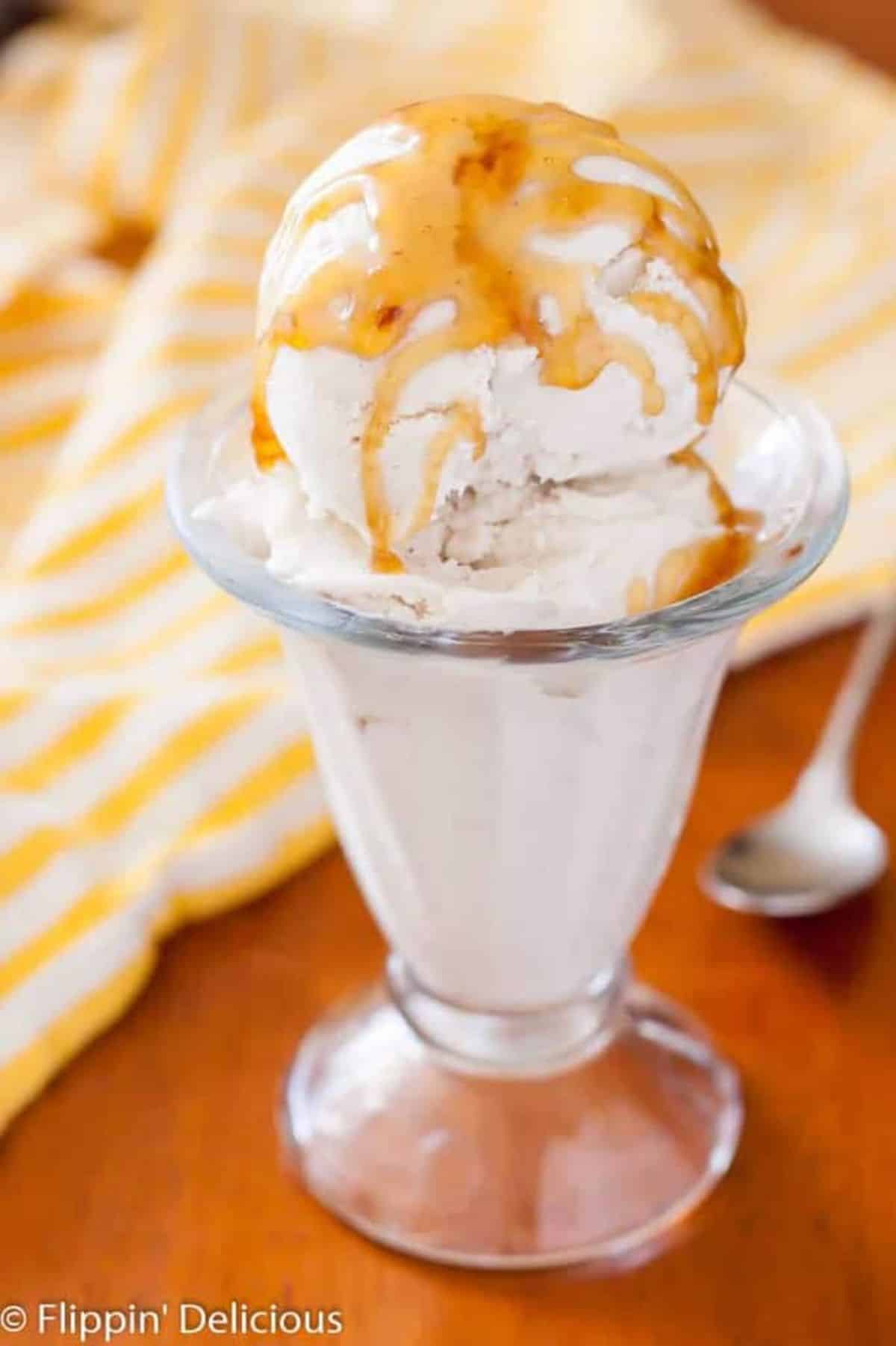 Delicious No-Churn Vanilla Ice Cream in a tall glass.