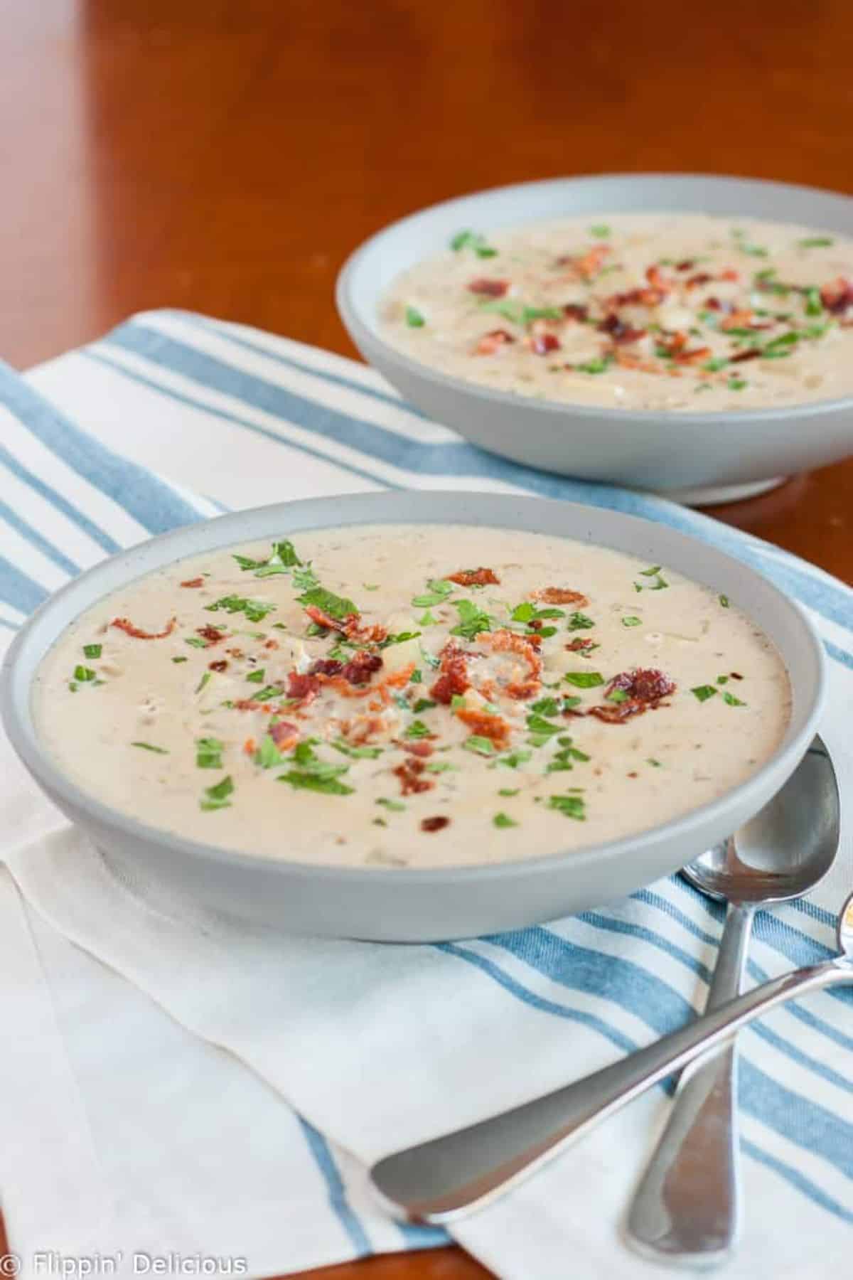 Delicious Gluten-Free Clam Chowder in two gray bowls.