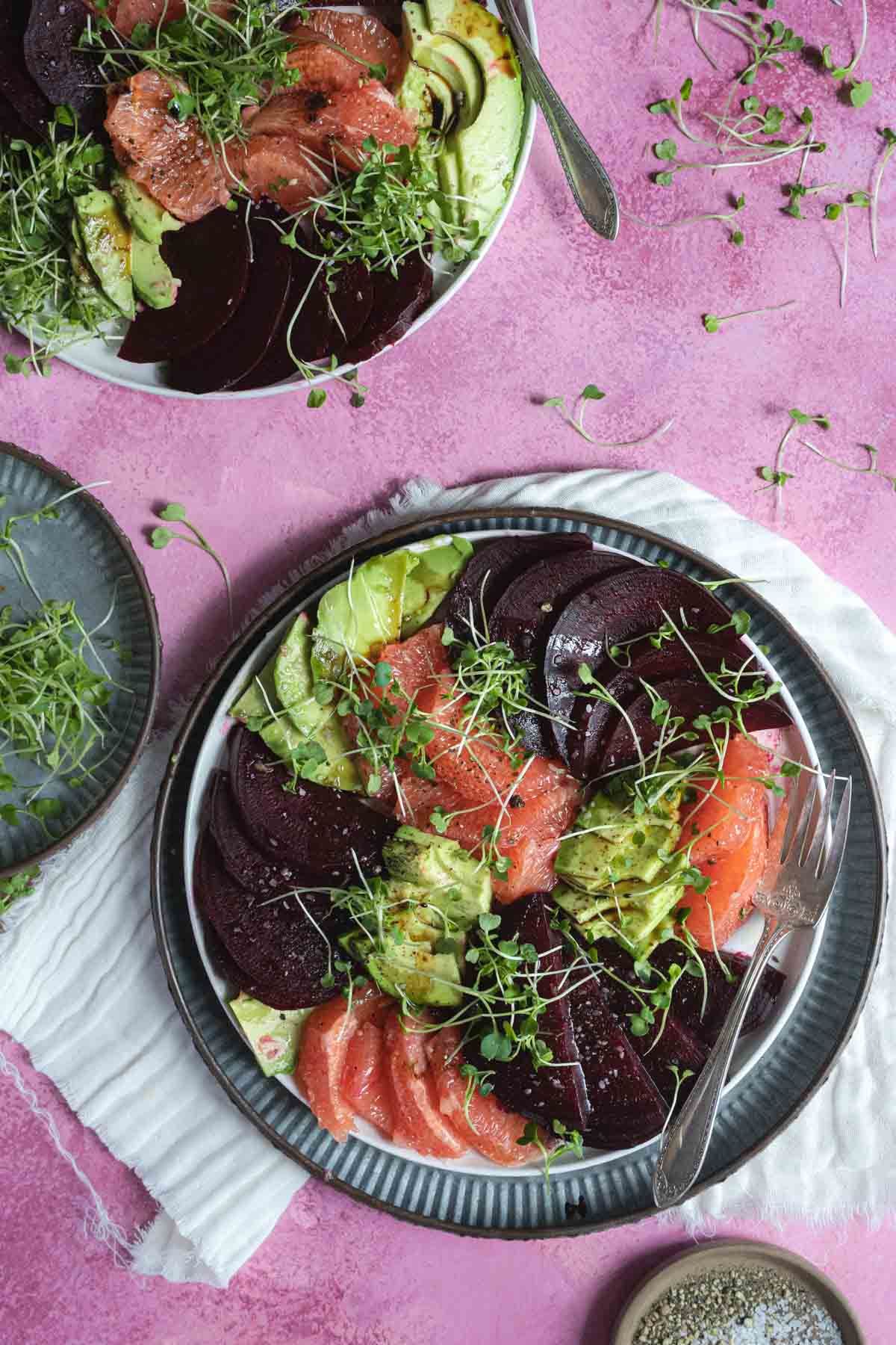 Gluten-free Beet and Grapefruit Salad on a white plate.