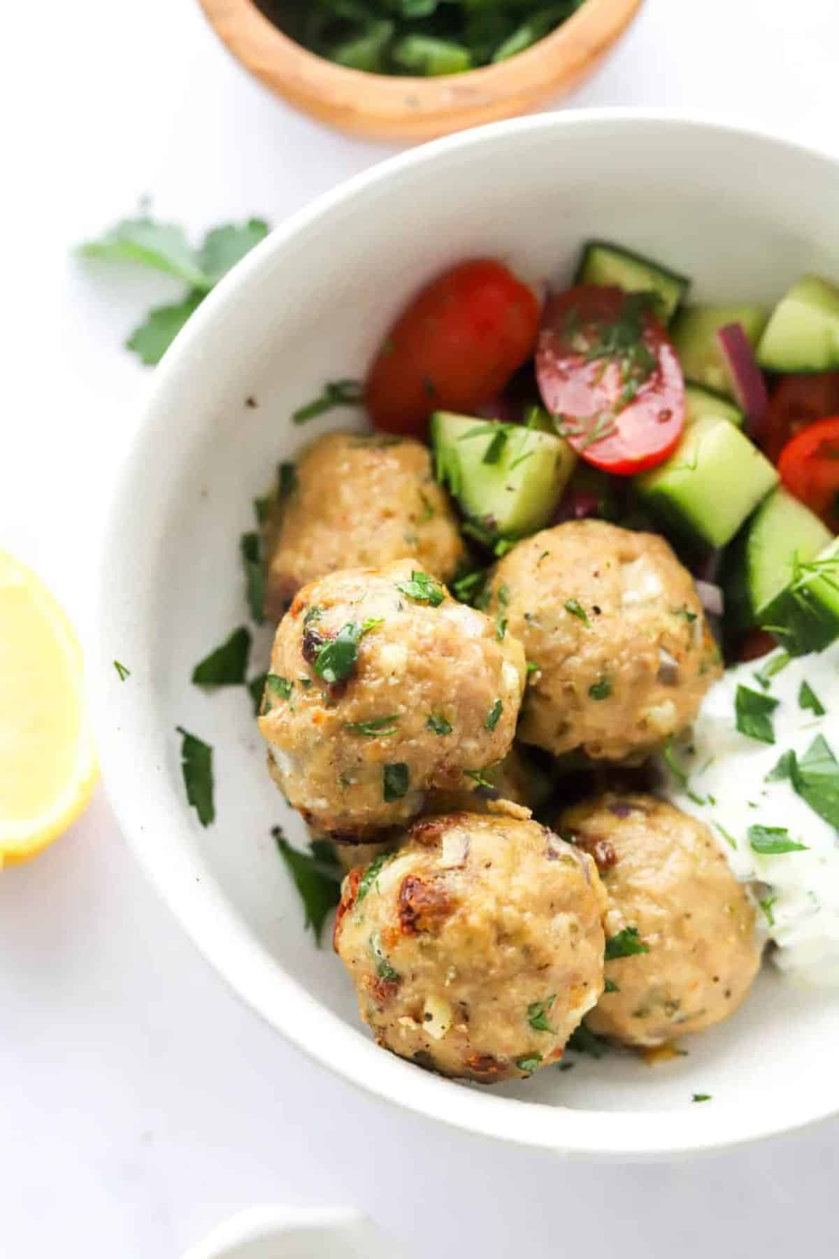 Flavorful 20-Minute Healthy Greek Meatballs in a white bowl.
