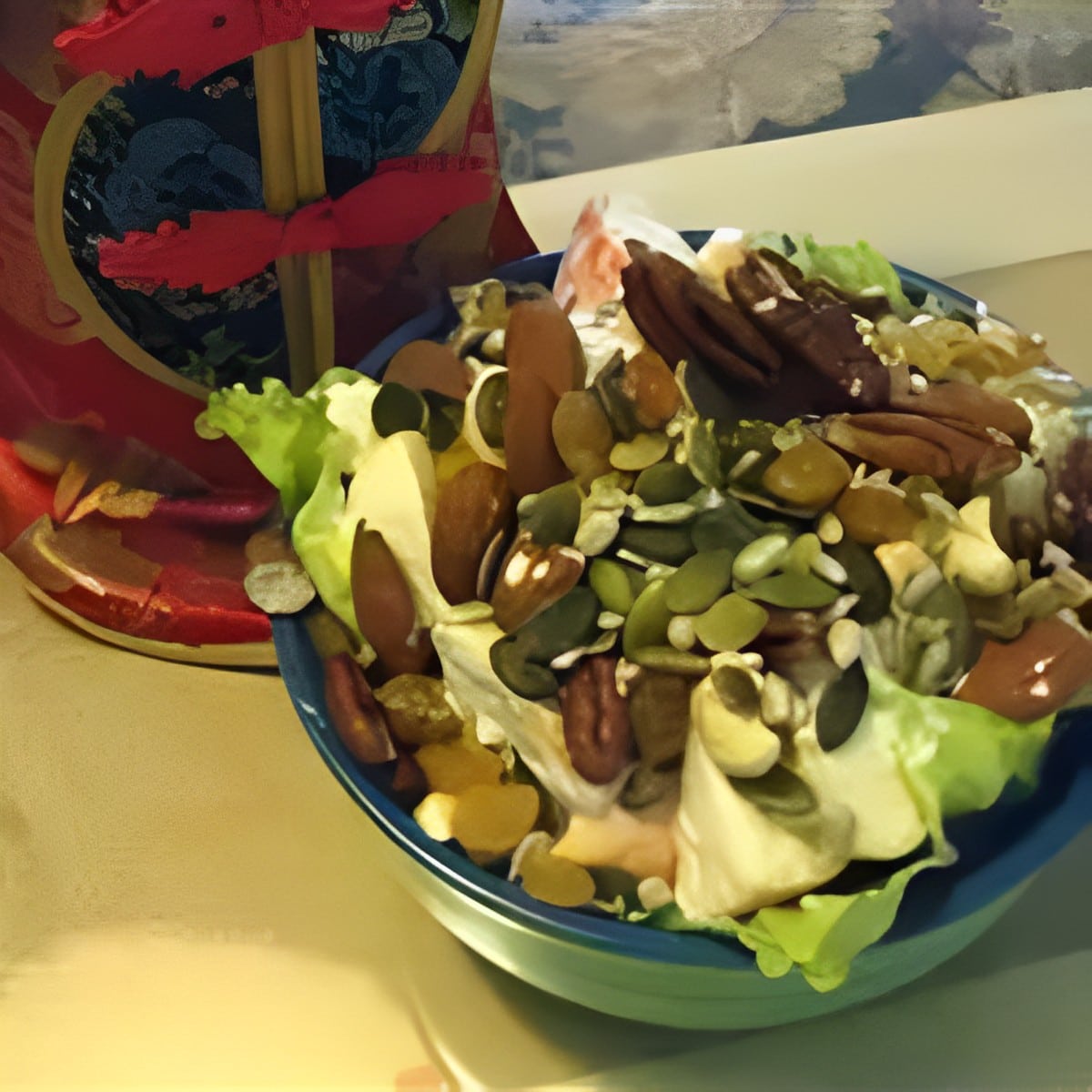 Delicious Apple Salad in a blue bowl.