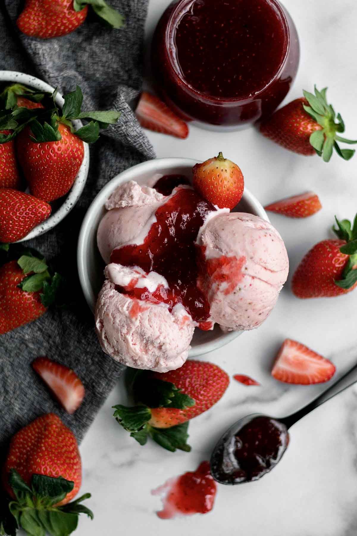 Mouth-watering Strawberry Ice Cream in a small white bowl.