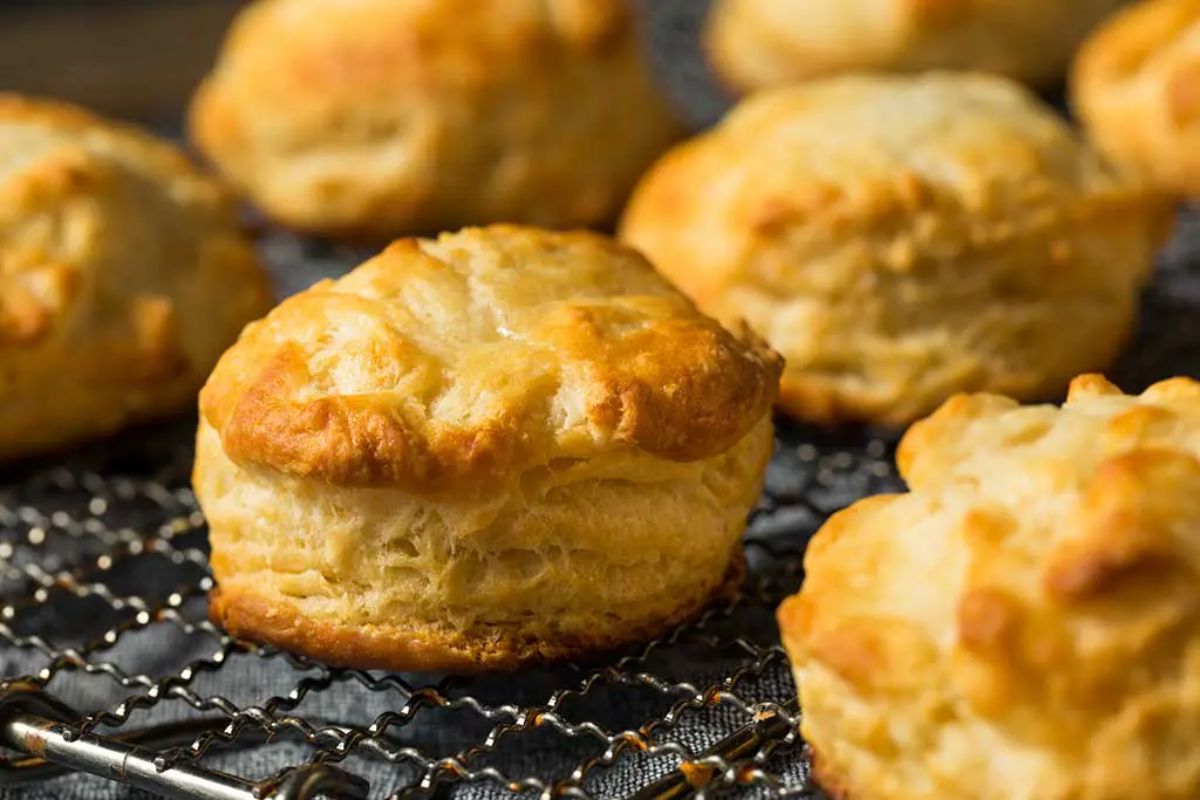 Crunchy Tapioca Flour Dinner Rolls on a resting grid.