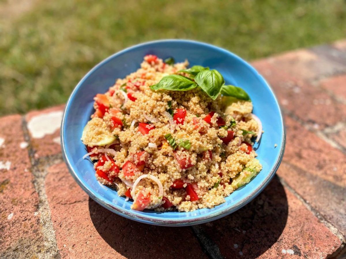 Flavorful Gluten-Free Panzanella in a blue bowl.