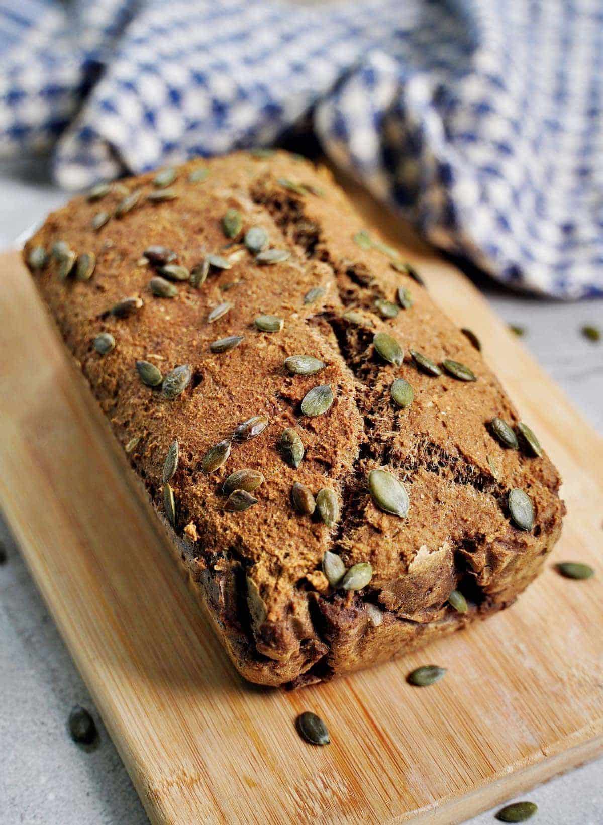 Delicious High-Protein Lentil Bread on a wooden cutting board.