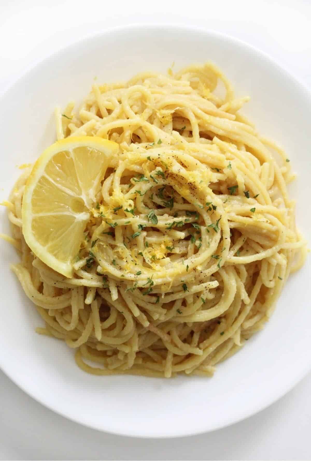 Healthy Vegan Pasta Al Limone on a white plate.