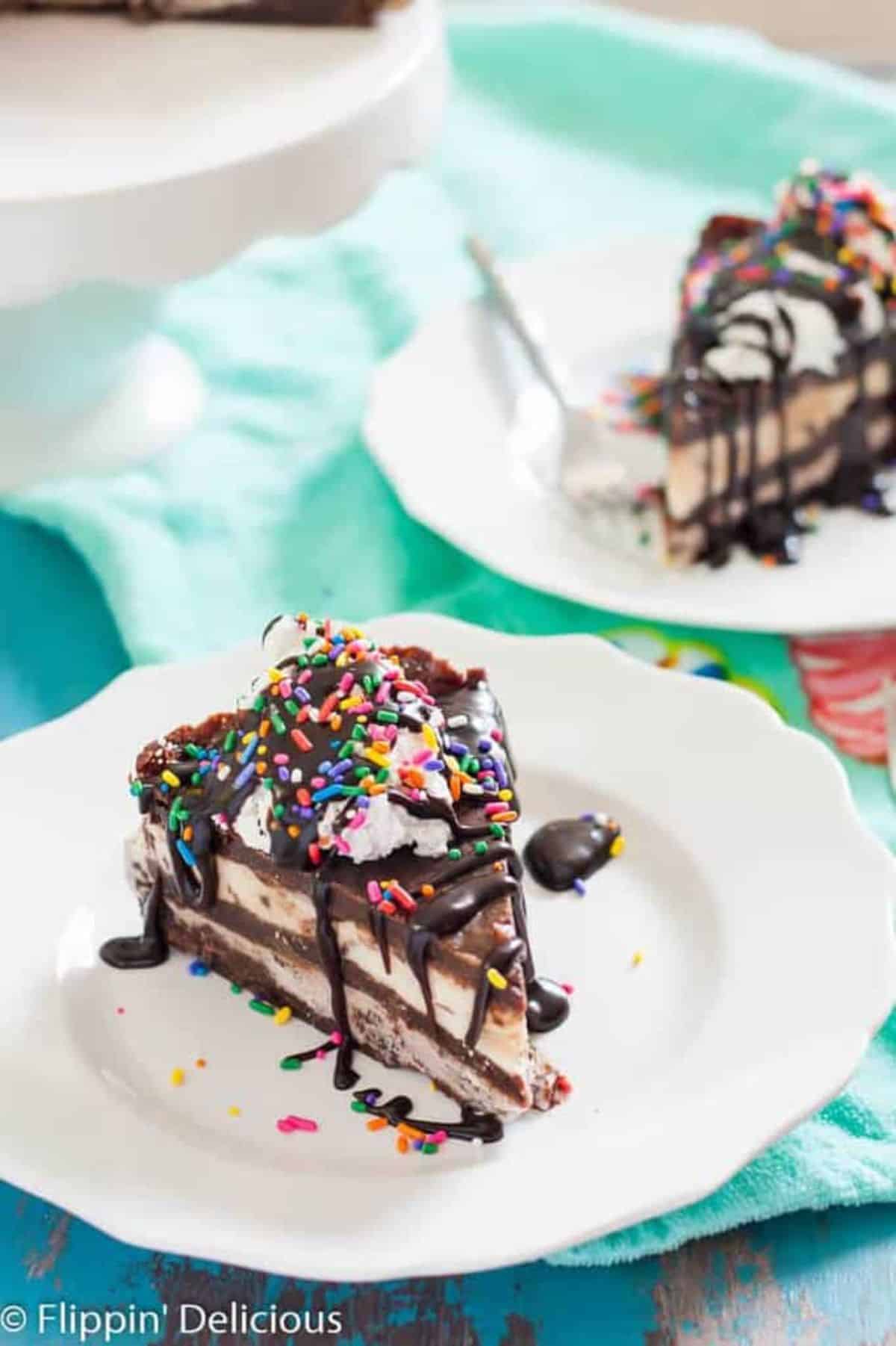 A piece of Brownie Ice Cream Cake on a white plate.