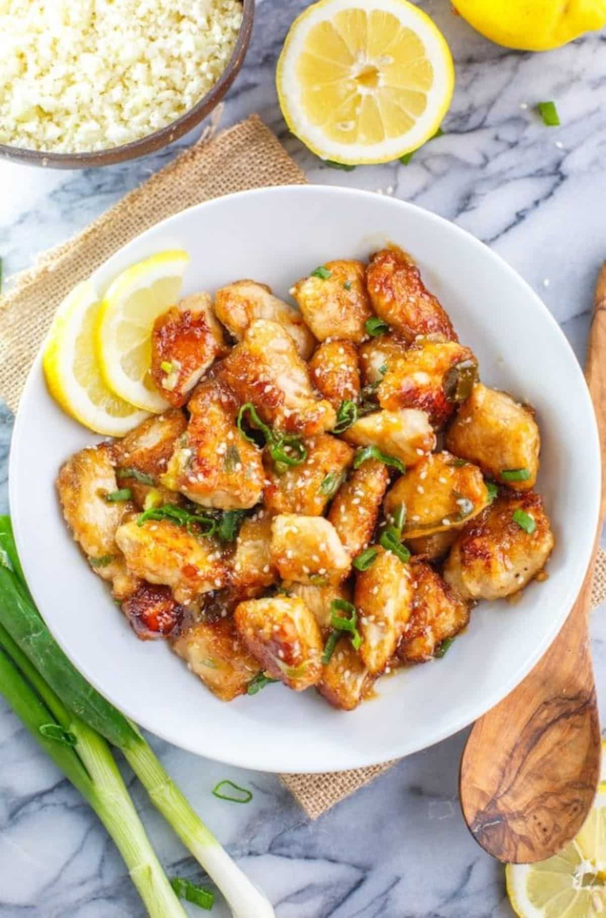 Delicious and Healthy Chinese Lemon Chicken on a white plate.