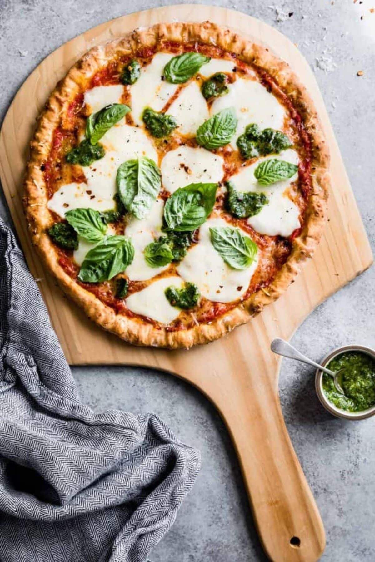 Scrumptious Tapioca Flour Pizza Crust on a wooden cutting board.