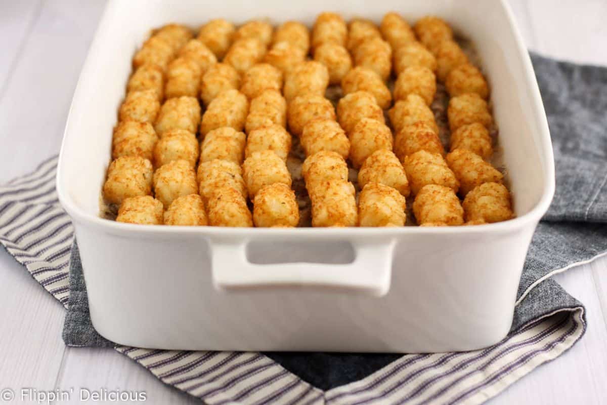 Crunchy Tater Tot in a white casserole.